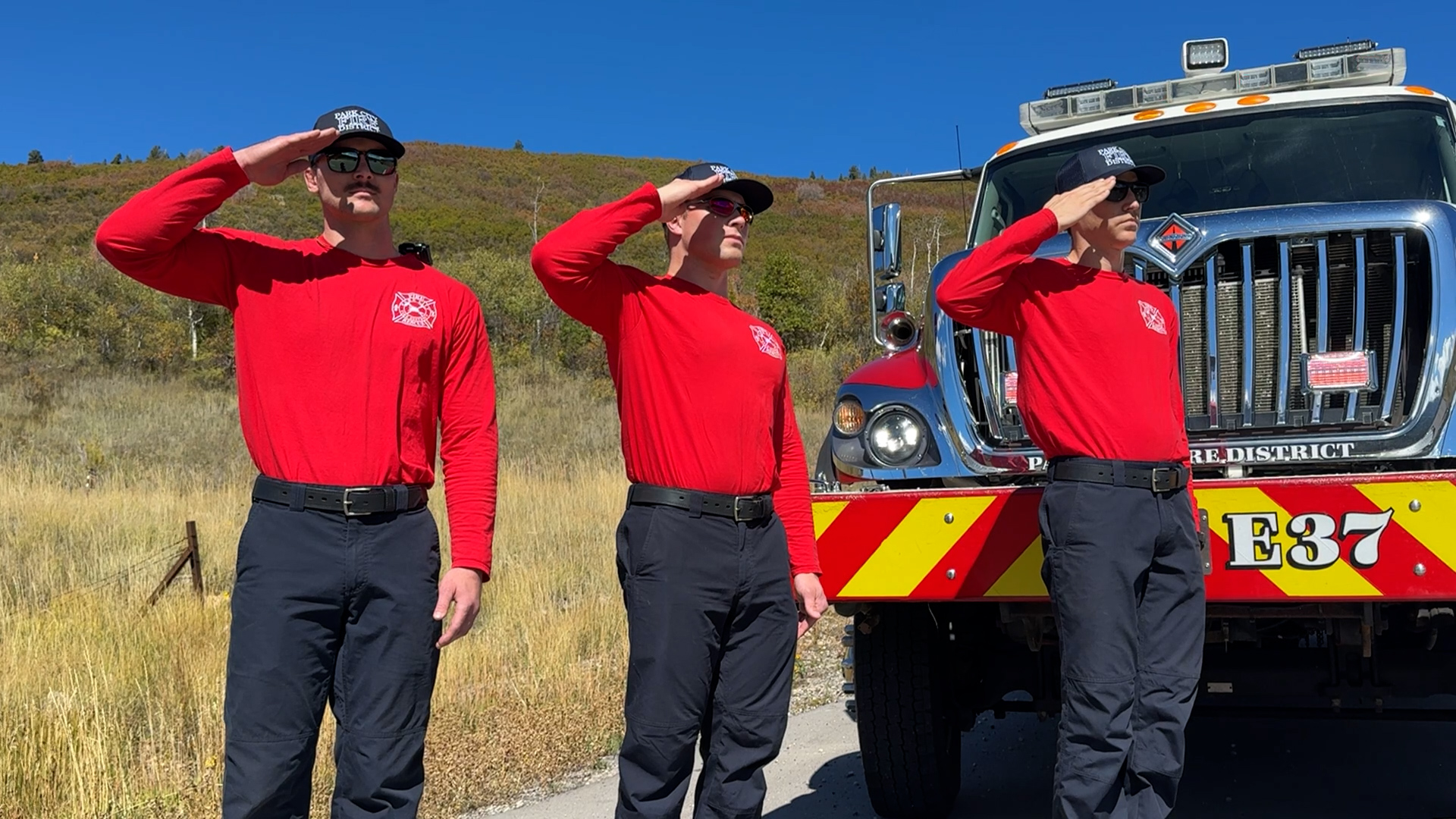 Firefighters from the Wasatch Fire District saluted as the procession went by on Tuesday.