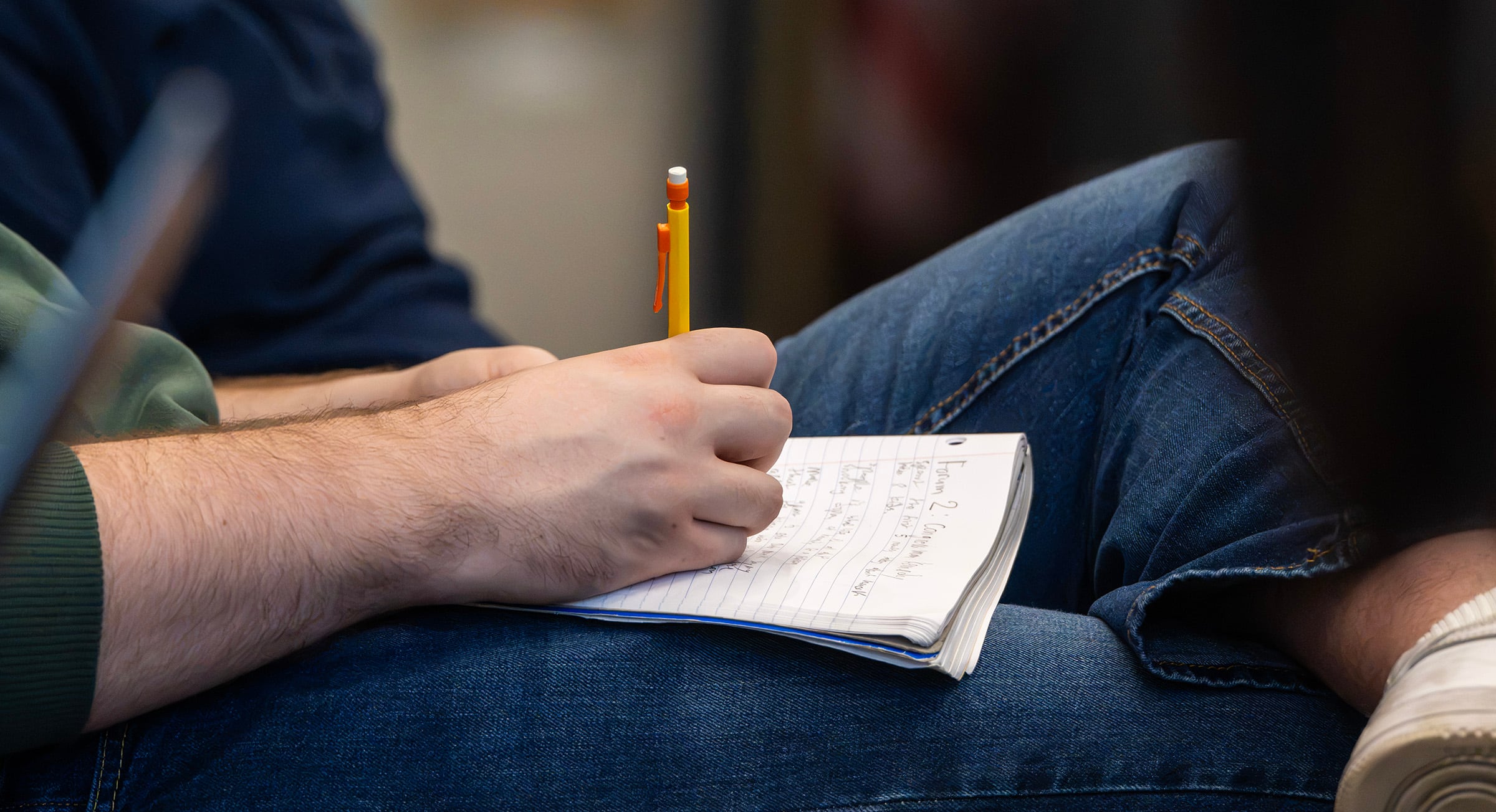 A student takes notes on a notepad while listening to Rep. Mike Kennedy speak with state Sen. Todd Weiler, R-Woods Cross, at Sutherland Institute's Congressional Series at the University of Utah in Salt Lake City on Tuesday. Conservatives are divided on in vitro fertilization and surrogacy.
