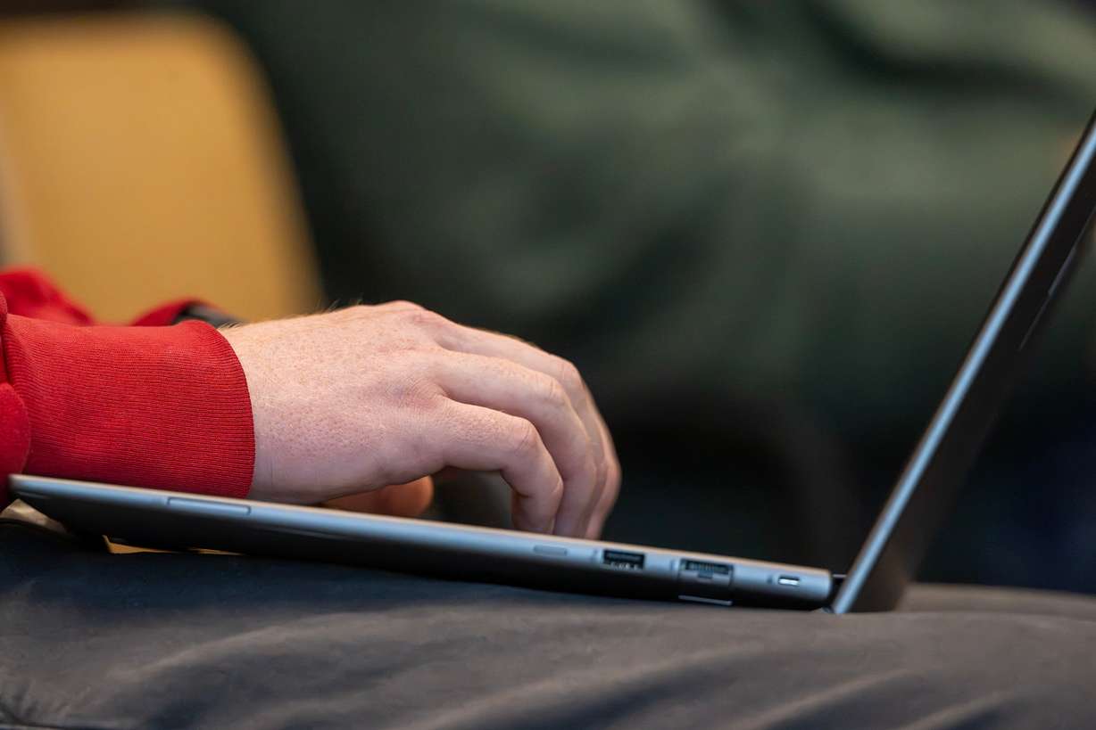 A student takes notes on a computer while listening to Rep. Mike Kennedy, R-Utah, speak with state Sen. Todd Weiler, R-Woods Cross, at Sutherland Institute's Congressional Series at the University of Utah in Salt Lake City on Tuesday. Kennedy spoke about how states must make decisions on healthcare.