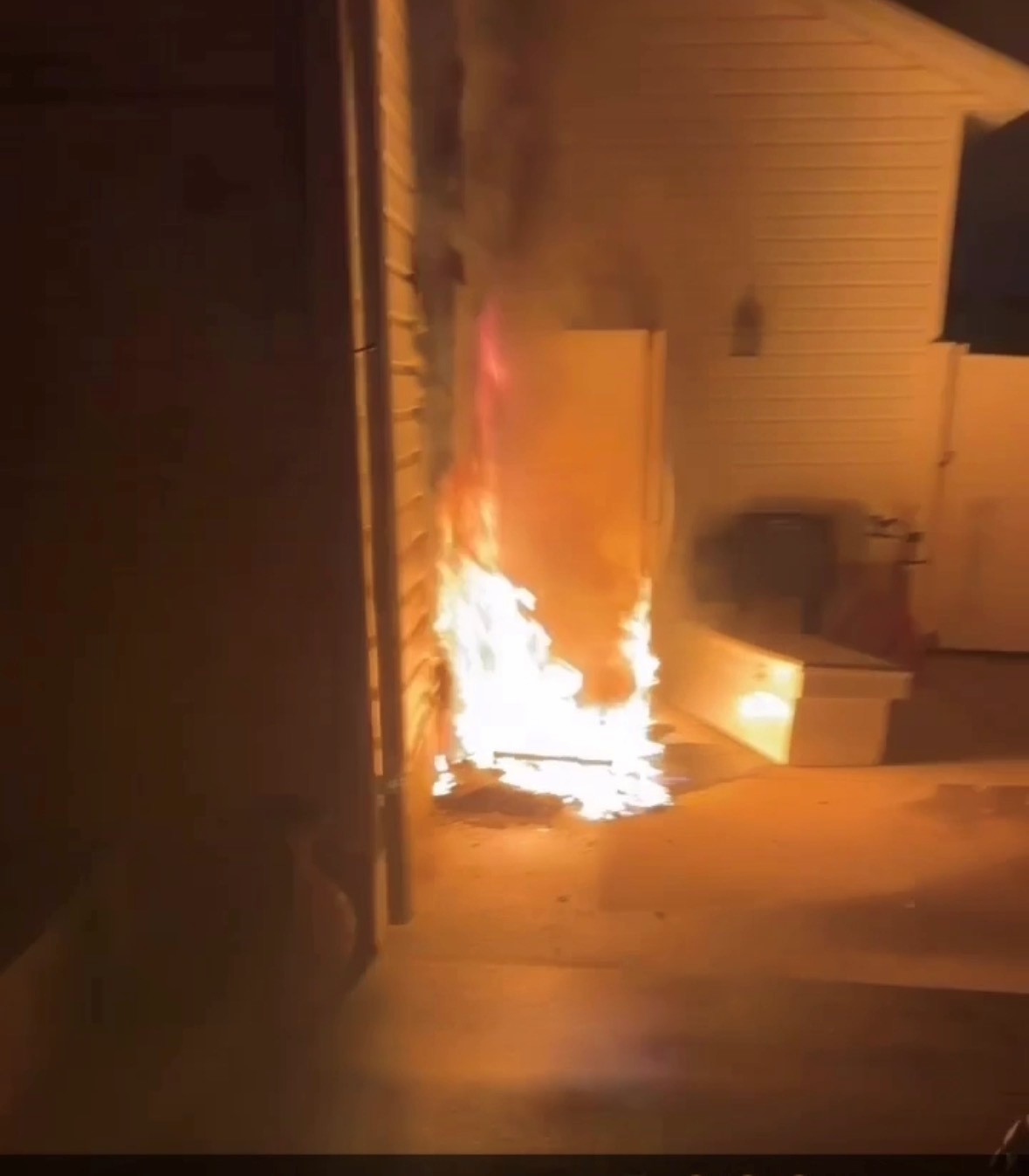 Cell phone video of fire on the side of Rushton's house shortly after it started.