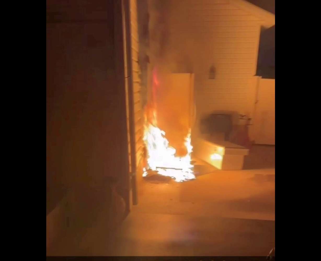 Cell phone video of fire on the side of Rushton's house shortly after it started.