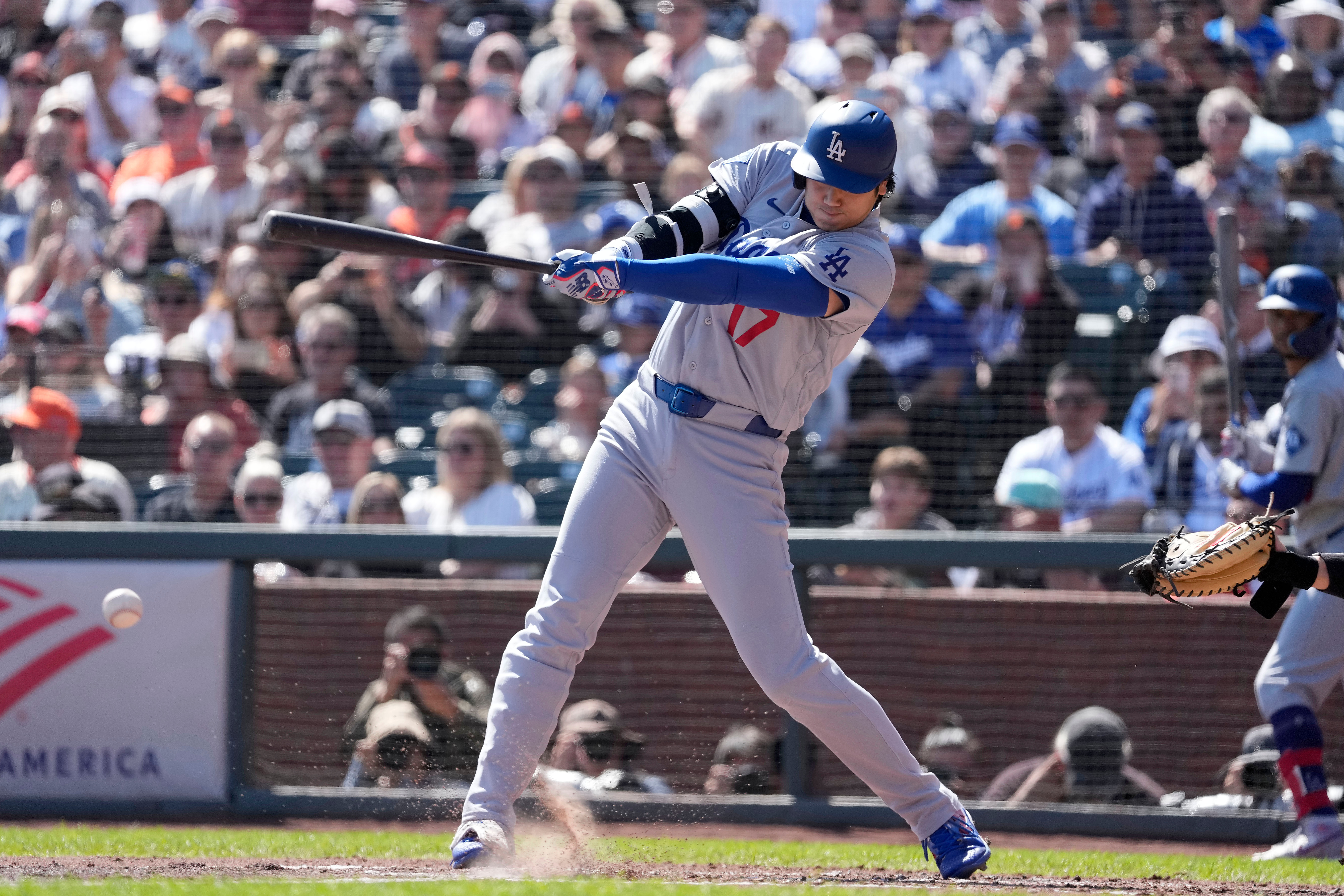 Los Angeles Dodgers' Shohei Ohtani hits a single against the San Francisco Giants during the third inning of a baseball game Sunday, Sept. 27, 2026, in San Francisco. 