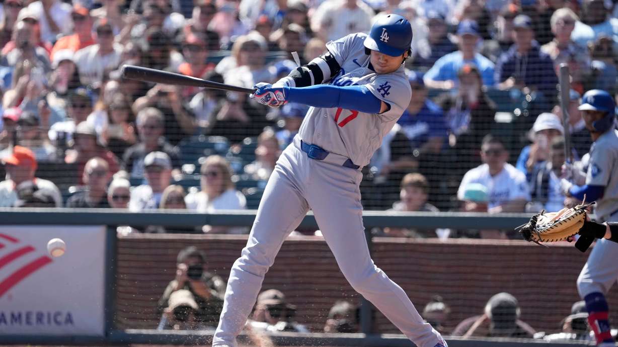 Los Angeles Dodgers' Shohei Ohtani hits a single against the San Francisco Giants during the third inning of a baseball game Sunday, Sept. 27, 2026, in San Francisco.