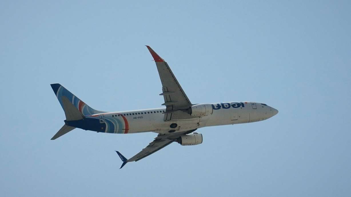 A FlyDubai aircraft takes off from Dubai International Airport in Dubai, United Arab Emirates, Wednesday. A fight between pilots on a FlyDubai flight forced an aircraft traveling to Israel to make an emergency landing in Saudi Arabia.
