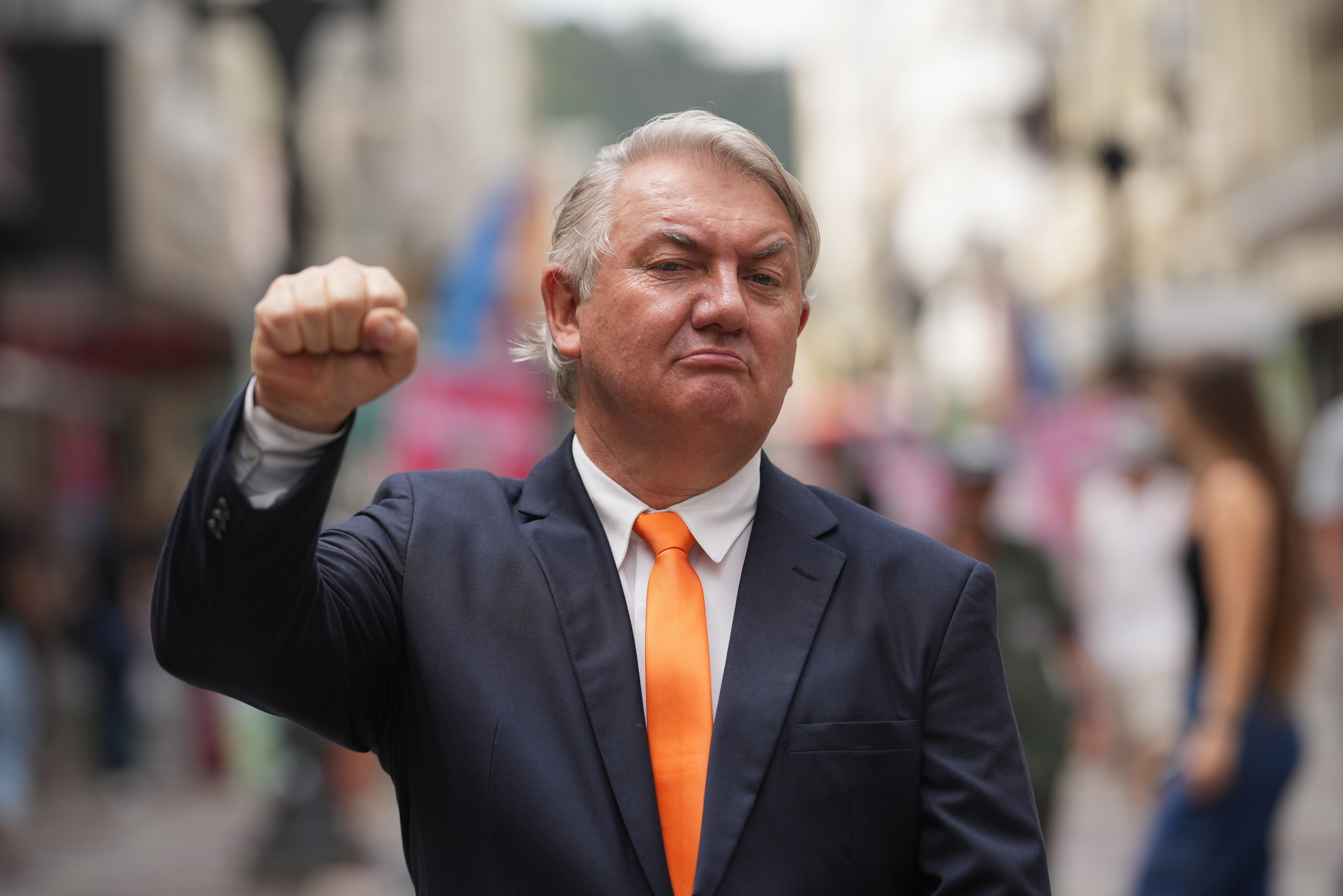 Plinio Vicentin Jr., who is running for federal lawmaker as "Plinio Trump," with the Novo Party representing Minas Gerais state, poses for a photo as he campaigns ahead of the general election in Juiz de Fora, Minas Gerais state, Brazil, on Monday.