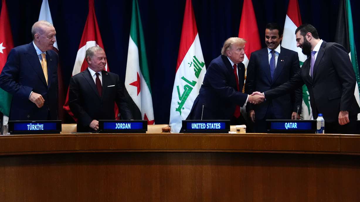 President Donald Trump shakes hands with Syria's President Ahmed al-Sharaa, joined by Turkey's President Recep Tayyip Erdogan, Jordan's King Abdullah II, and Qatar's Emir Sheikh Tamim bin Hamad Al Thani, at a multilateral meeting with the Gulf Cooperation Council during the United Nations General Assembly, Sept. 22. The U.S. removed Syria's arms export ban on Wednesday.
