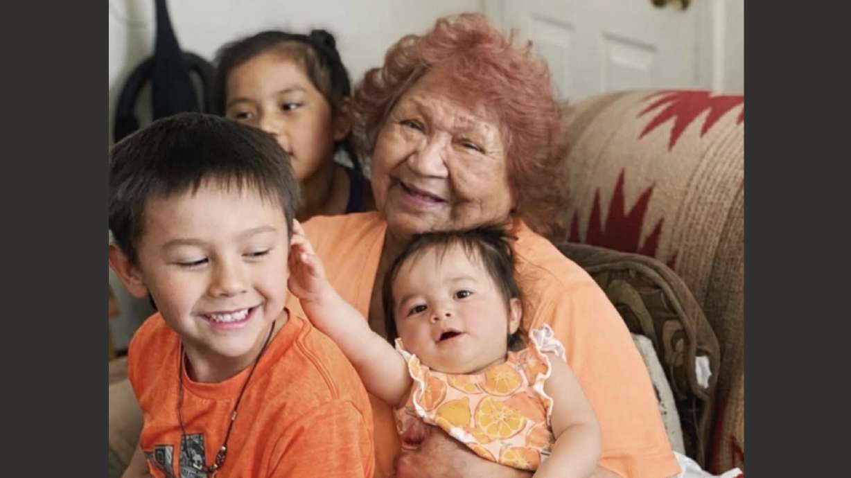Nikki Borchardt Campbell's grandmother, Earnestine Lehi, holding Borchardt Campbell's children.
