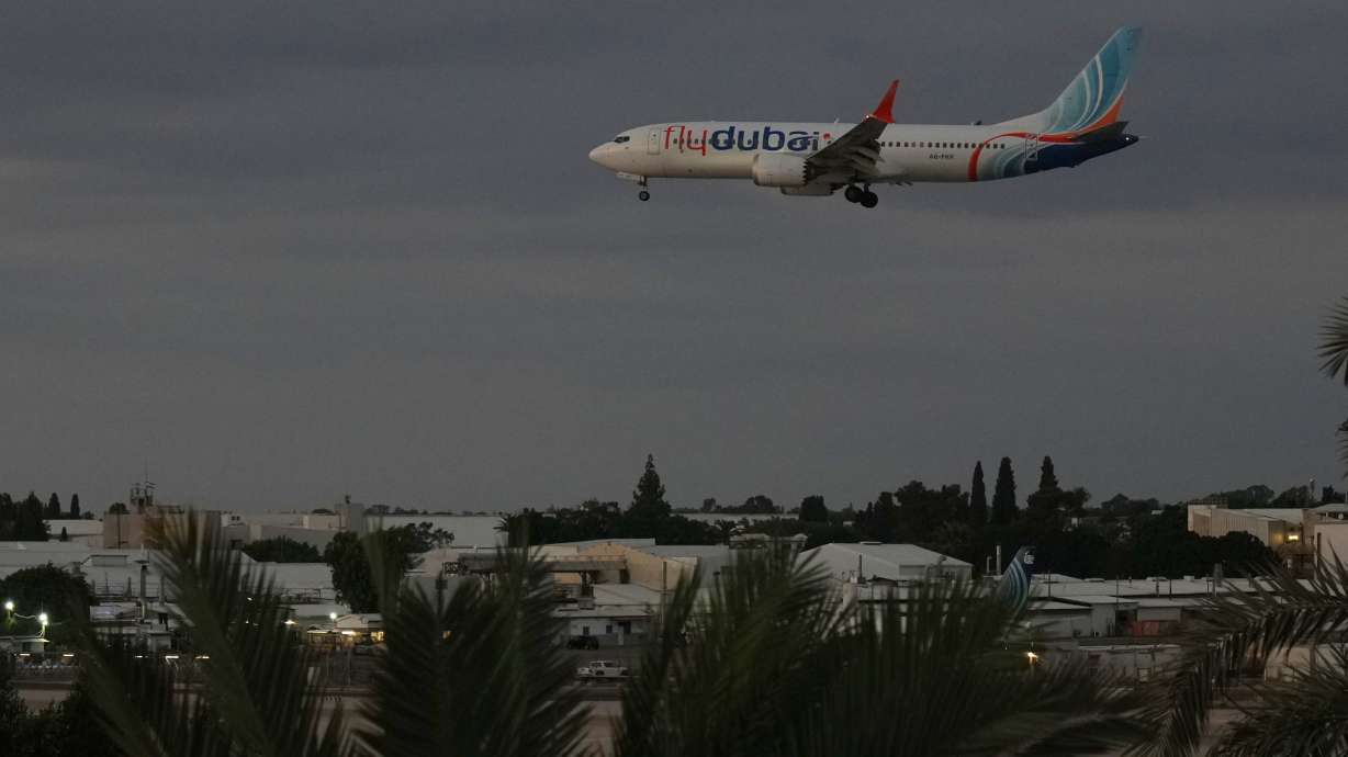 A FlyDubai aircraft carrying Israelis who experienced an emergency landing in Saudi Arabia arrives at Ben Gurion International Airport, near Tel Aviv, Israel, Wednesday.