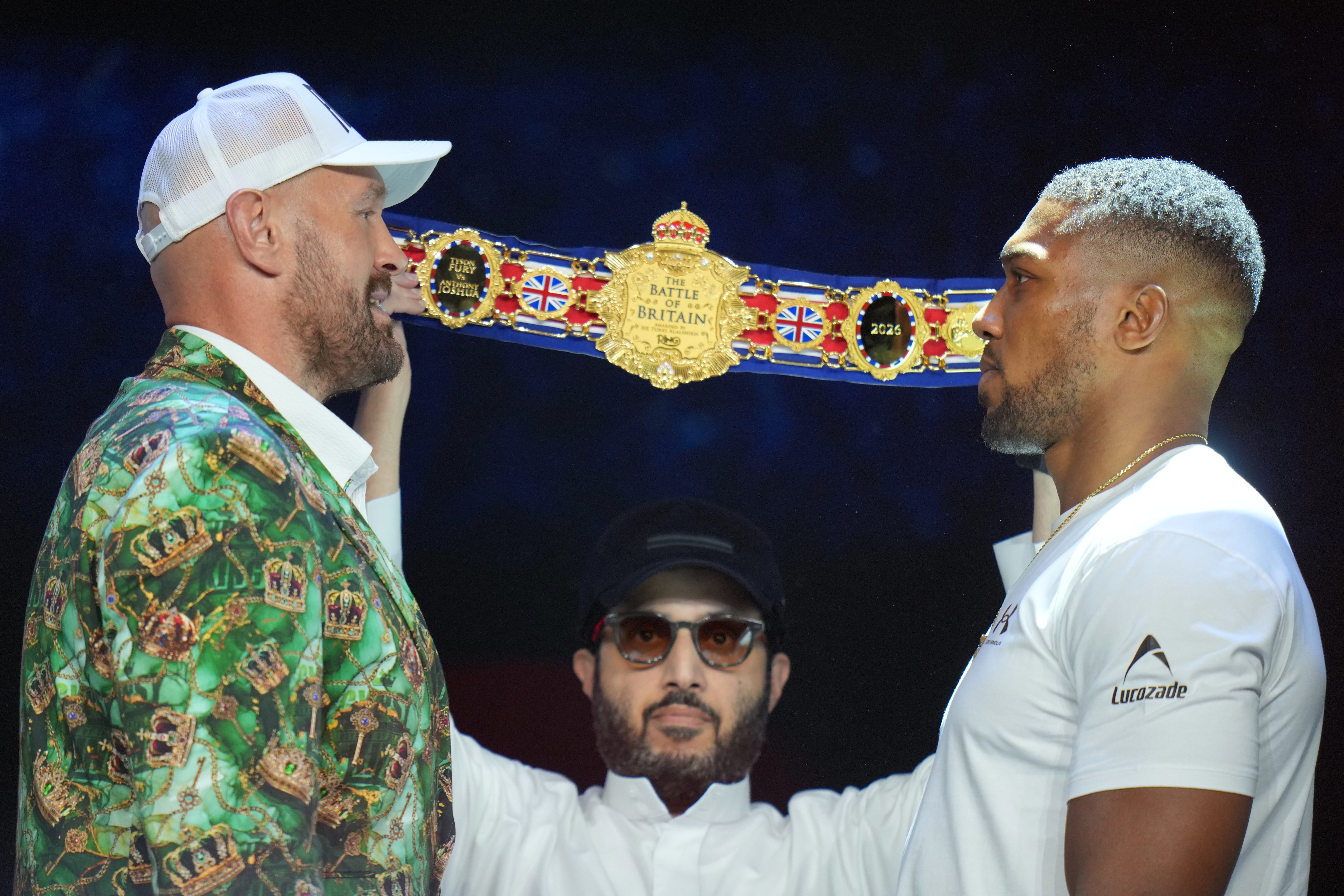 Tyson Fury, left, and Anthony Joshua, right, face off after a Press Conference in London, Wednesday, Sept. 30, 2026, to promote their upcoming fight which will take place at the Principality Stadium in Cardiff on Dec.11.