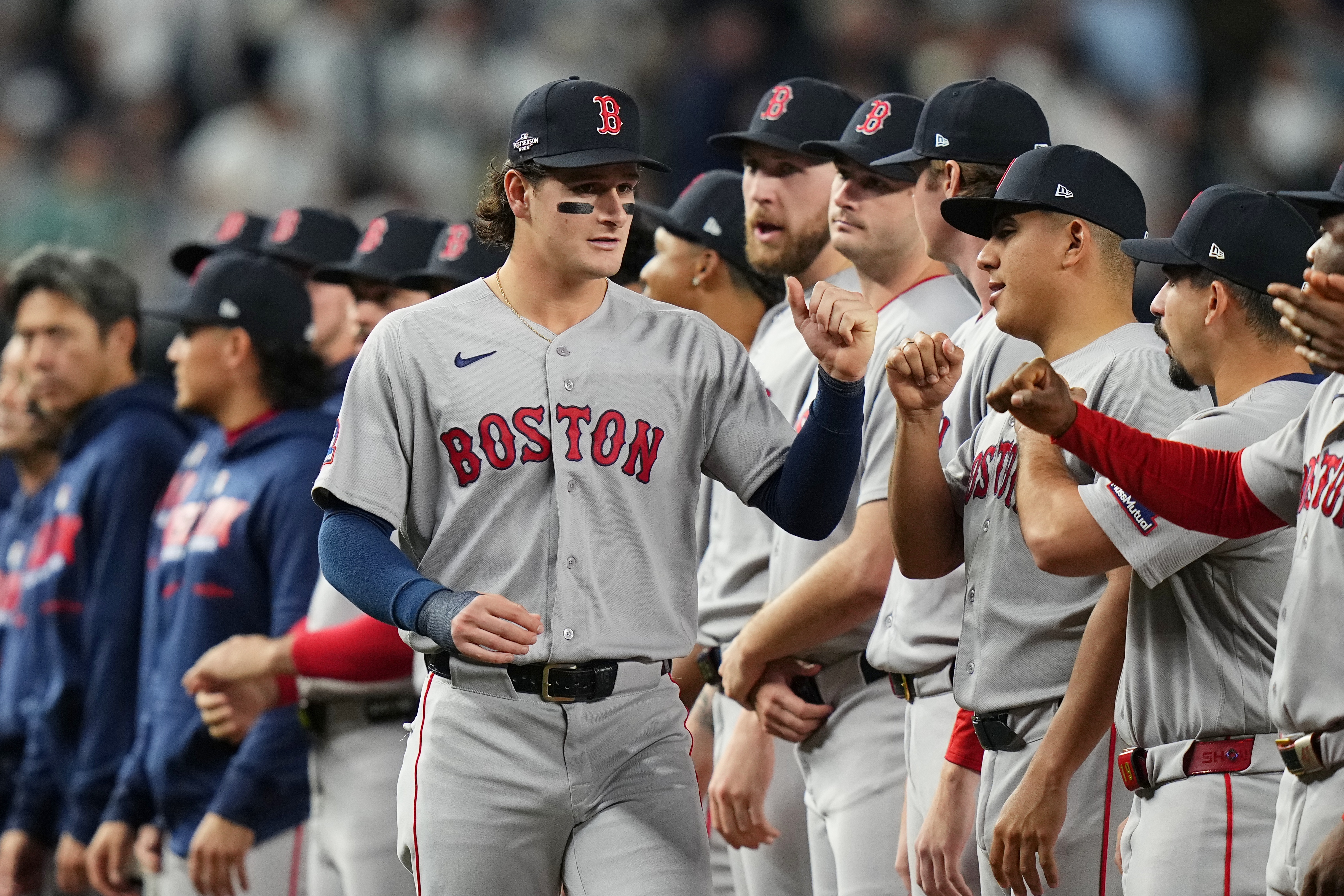 Boston Red Sox designated hitter Roman Anthony greets teammates prior to Game 1 of baseball's American League Wild Card Series against the New York Yankees, Tuesday, Sept. 29, 2026, in New York. 