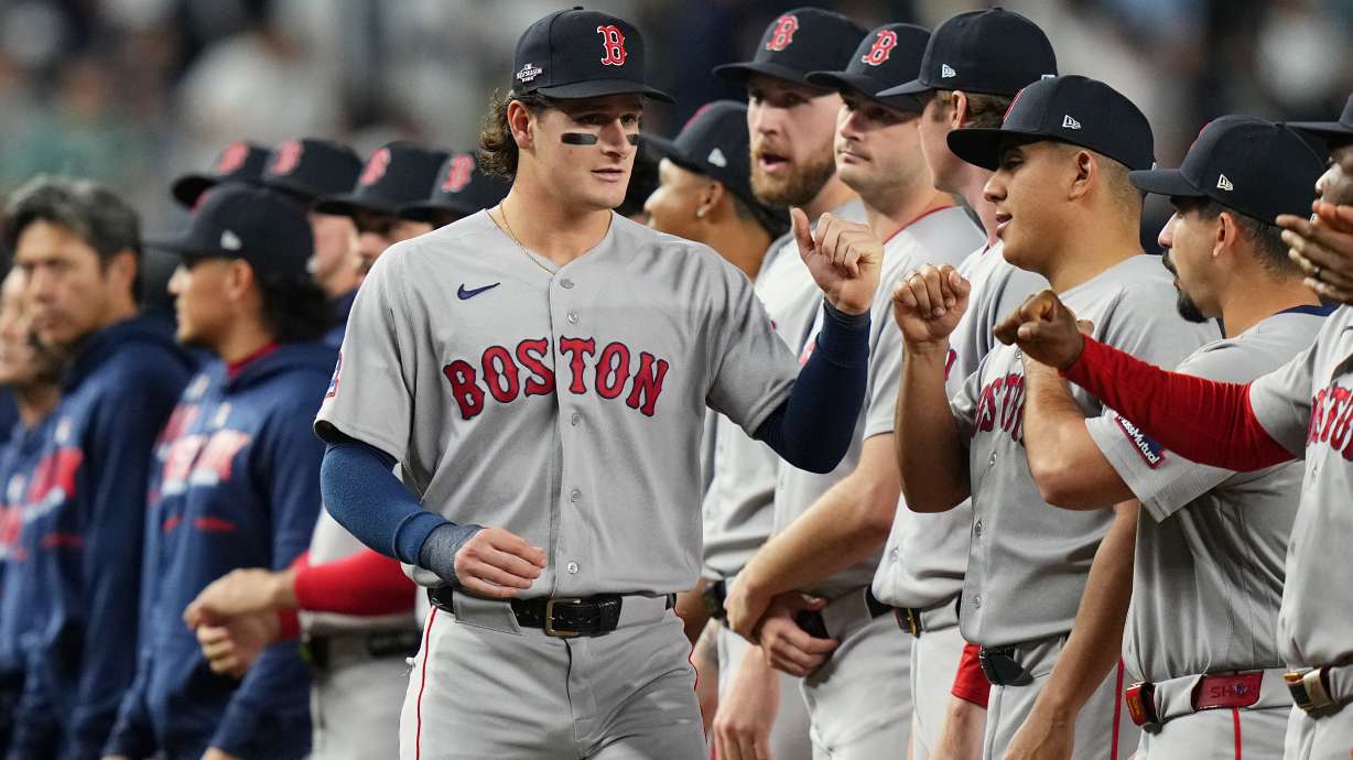 Boston Red Sox designated hitter Roman Anthony greets teammates prior to Game 1 of baseball's American League Wild Card Series against the New York Yankees, Tuesday, Sept. 29, 2026, in New York.