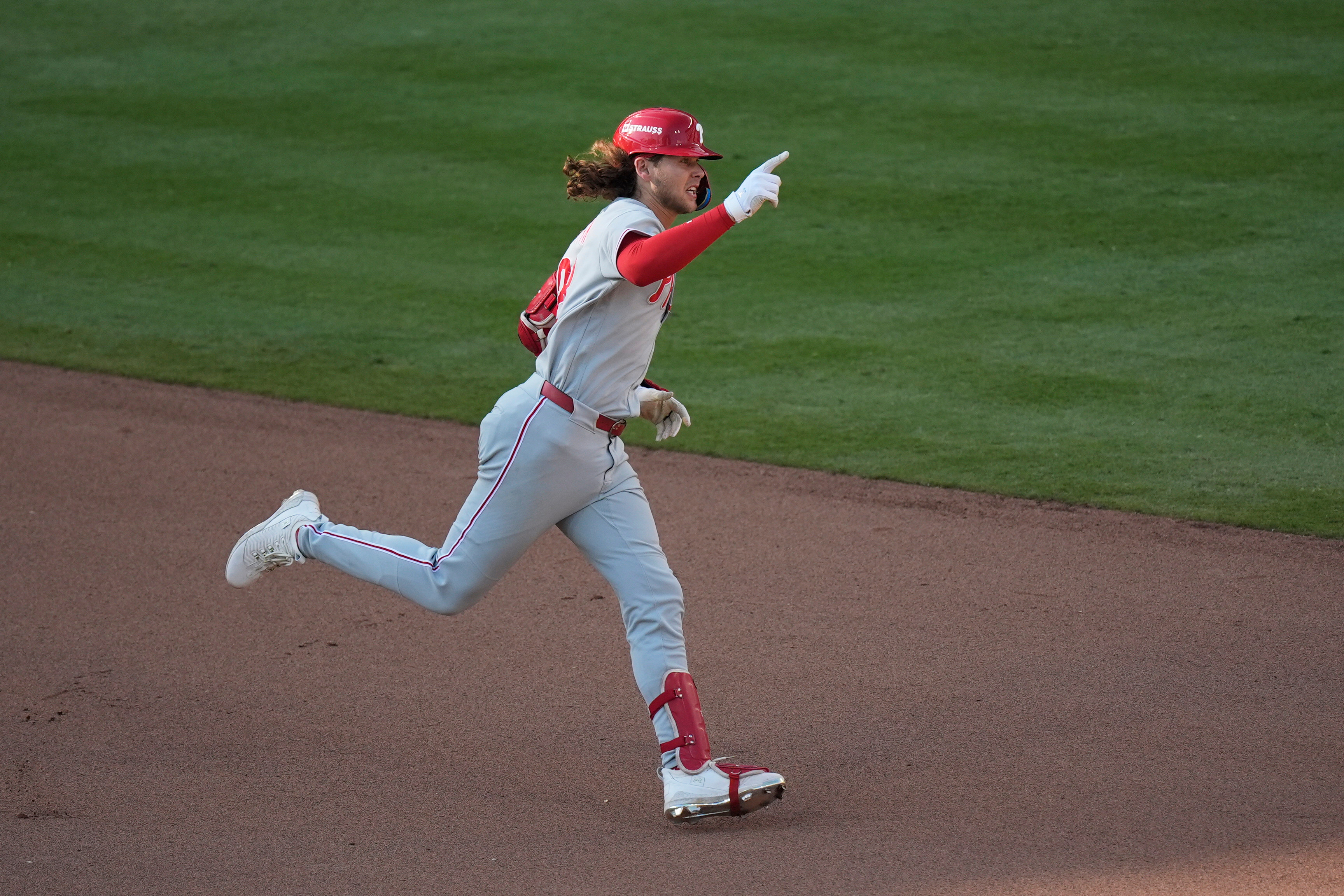 Philadelphia Phillies' Alec Bohm celebrates his home run against the Atlanta Braves in the 10th inning during Game 2 of baseball's National League Wild Card Series Wednesday, Sept. 30, 2026, in Atlanta. 