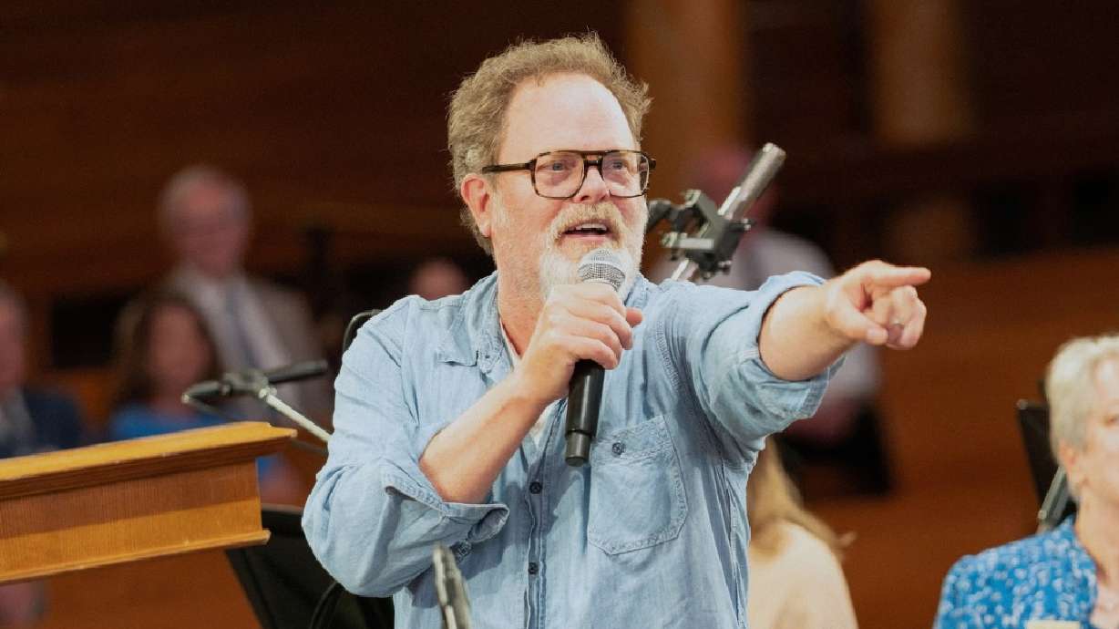 Rainn Wilson interacts with the Tabernacle Choir at Temple Square last week. He visited the choir while working on a documentary about what God means in the modern world.