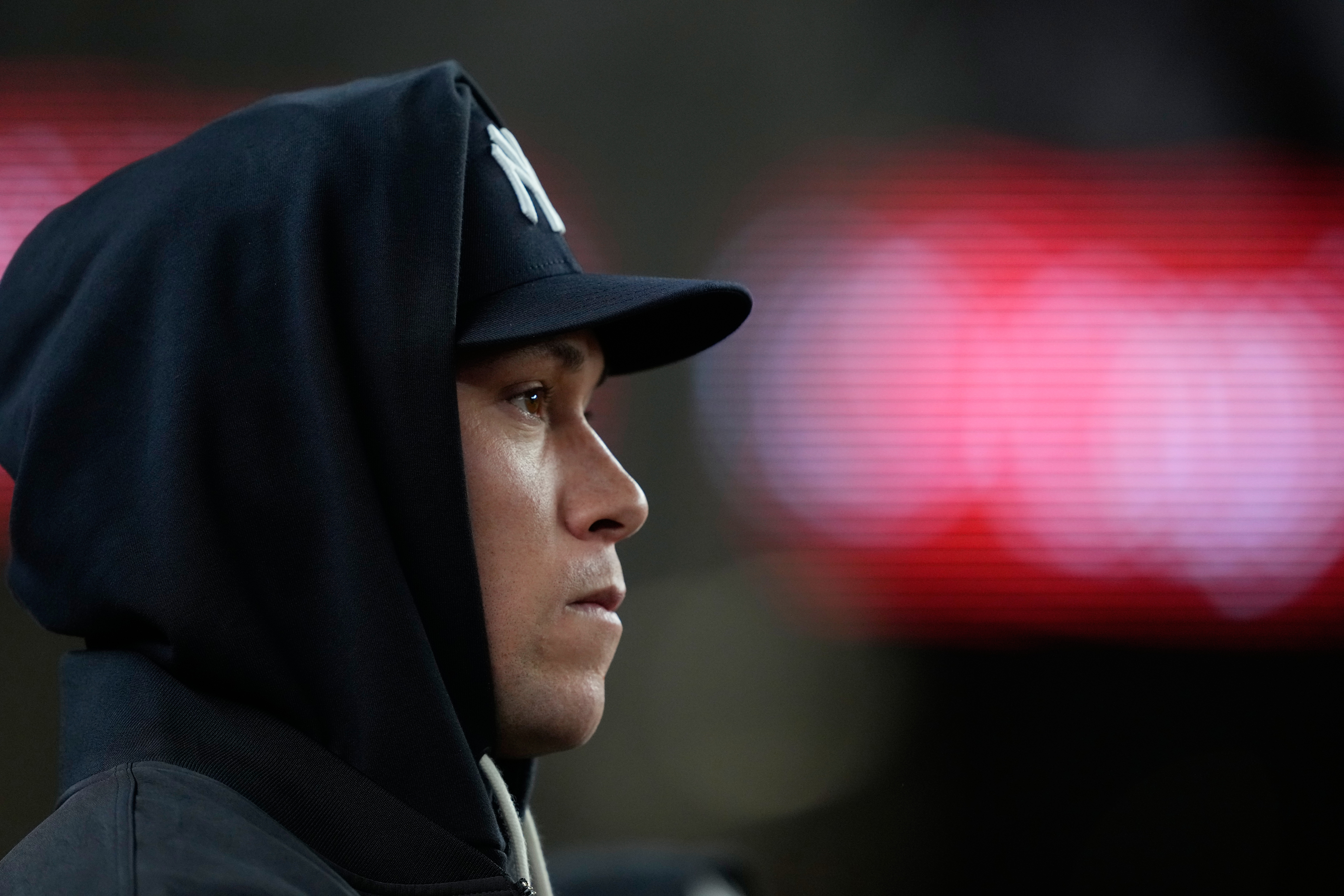 New York Yankees' Aaron Judge looks on from the dugout during the second inning in Game 1 of baseball's American League Wild Card Series against the Boston Red Sox, Tuesday, Sept. 29, 2026, in New York. 