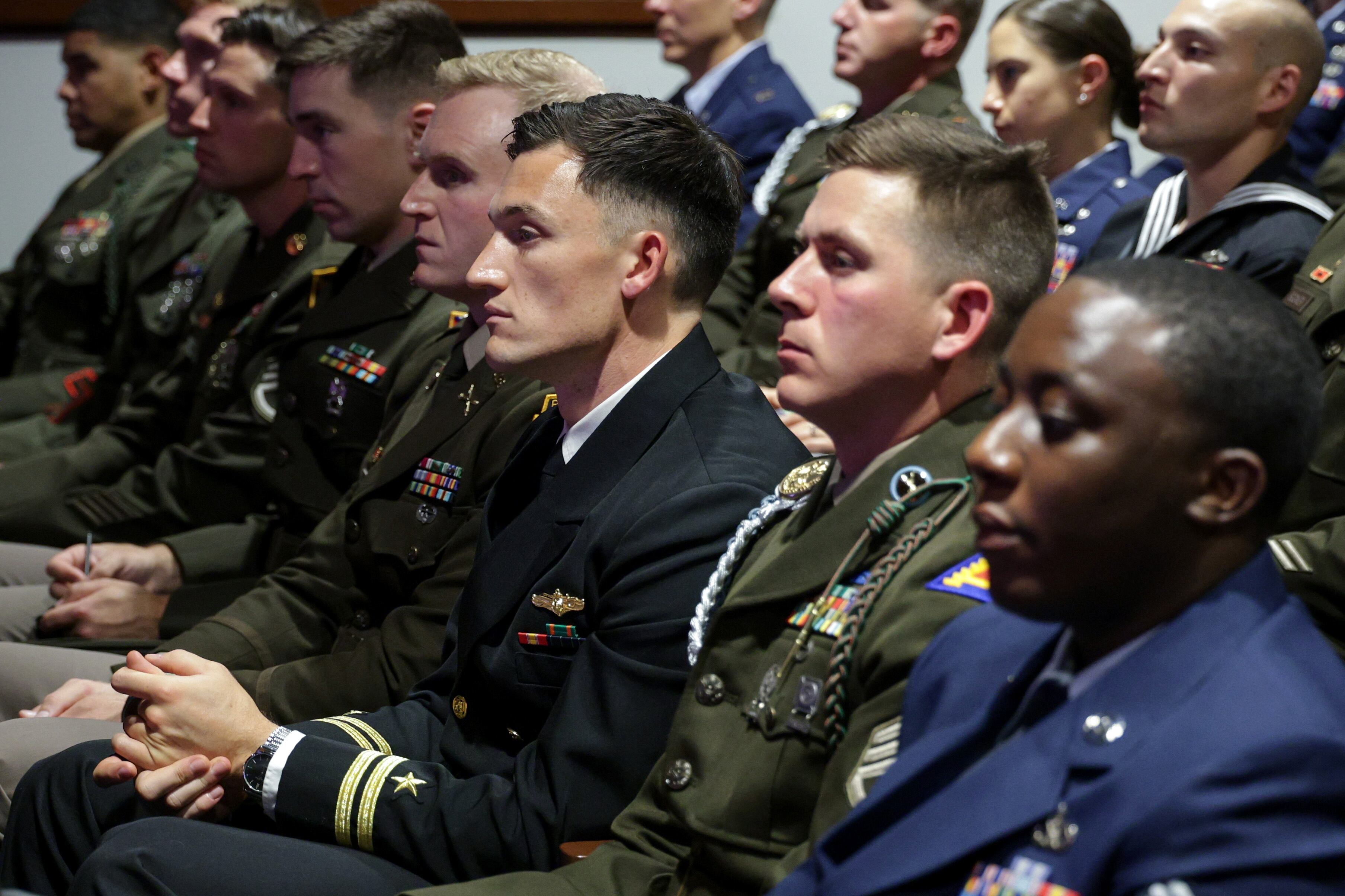 Members of the military listen as Secretary of Defense Pete Hegseth gives a "State of the Force" address at Marine Corps Base Quantico, Wednesday, in Quantico, Va. Hegseth again called for a return to the "warrior ethos" in the speech.