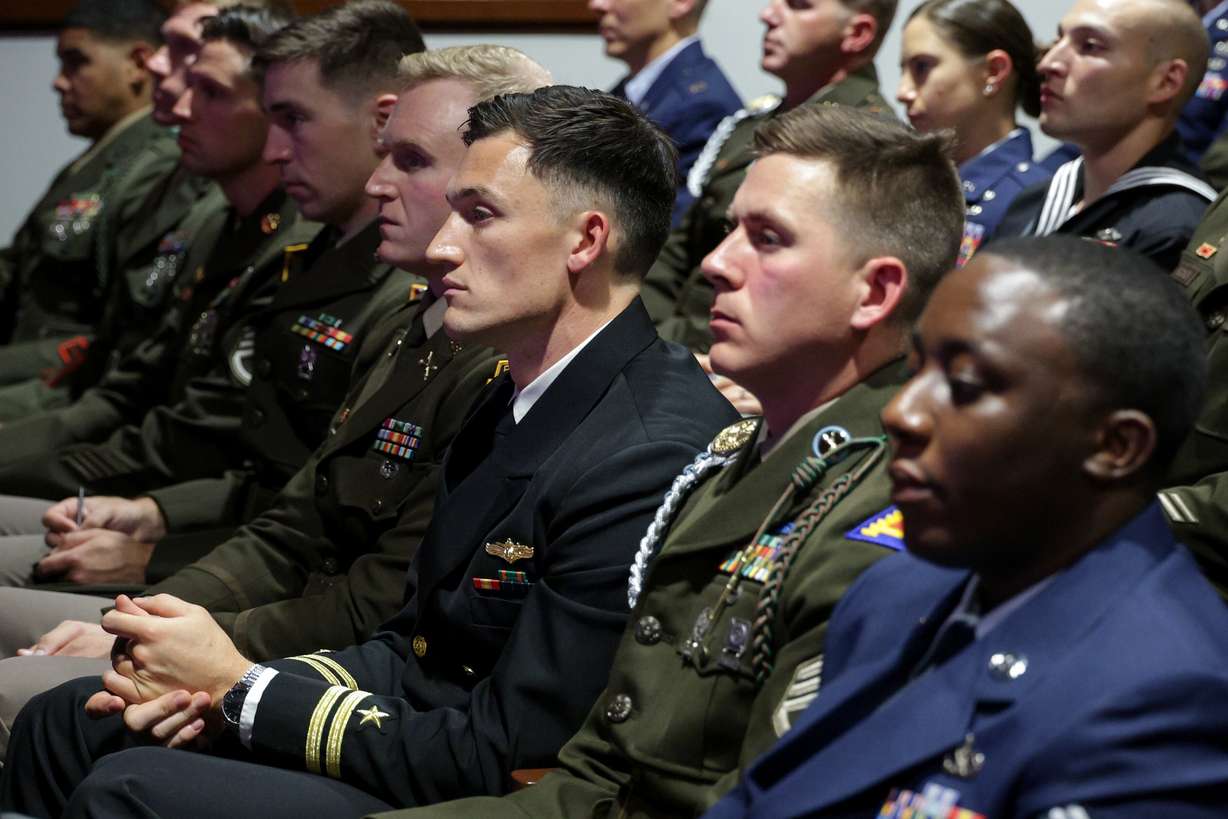 Members of the military listen as Secretary of Defense Pete Hegseth gives a "State of the Force" address at Marine Corps Base Quantico, Wednesday, in Quantico, Va. Hegseth again called for a return to the "warrior ethos" in the speech.