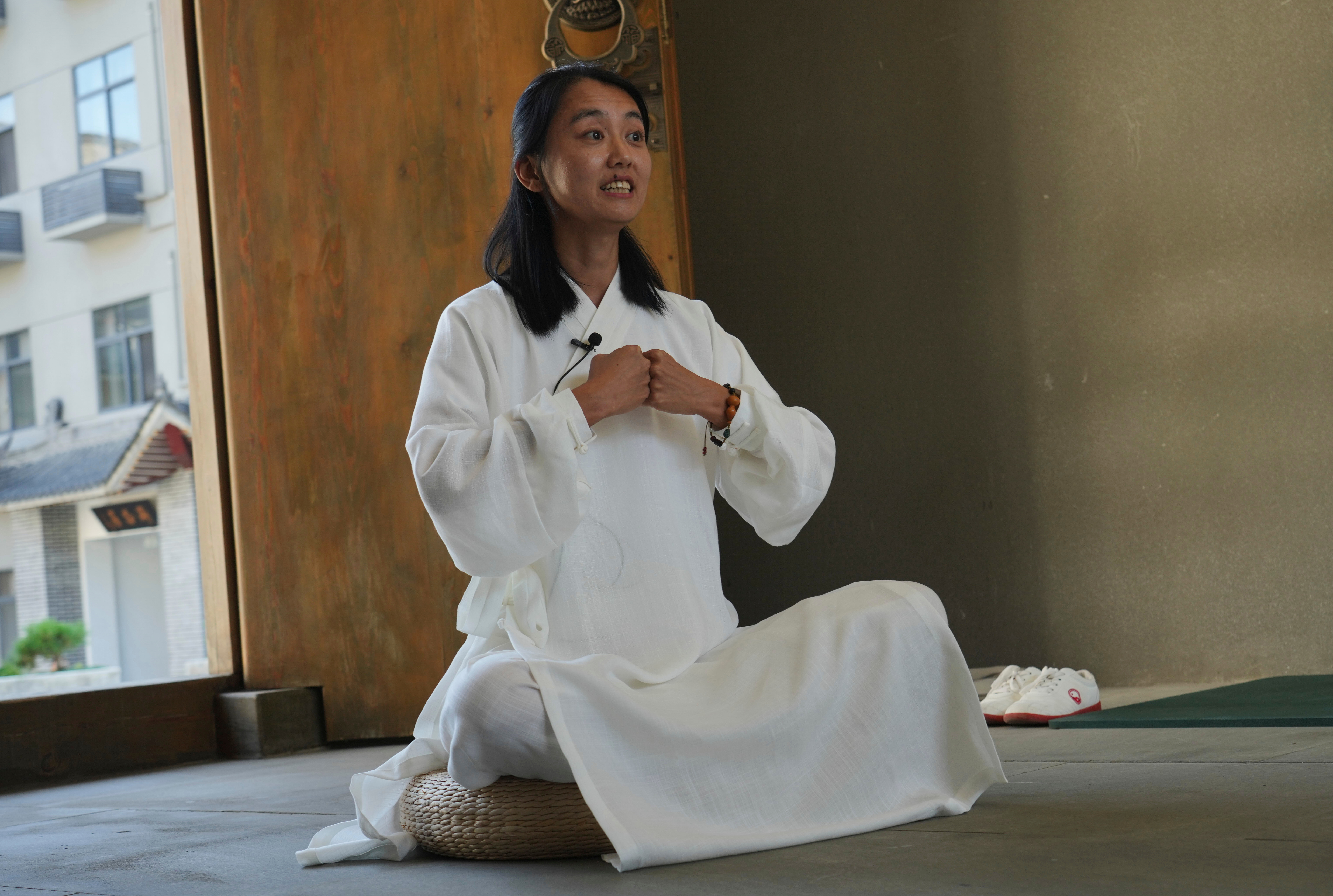 Guo Xinyi, a Chinese student at the Wudang Taoist Traditional Kung Fu Academy, speaks during an interview near Wudang Mountain in Shiyan city in central China's Hubei province on Friday, Sept. 4.