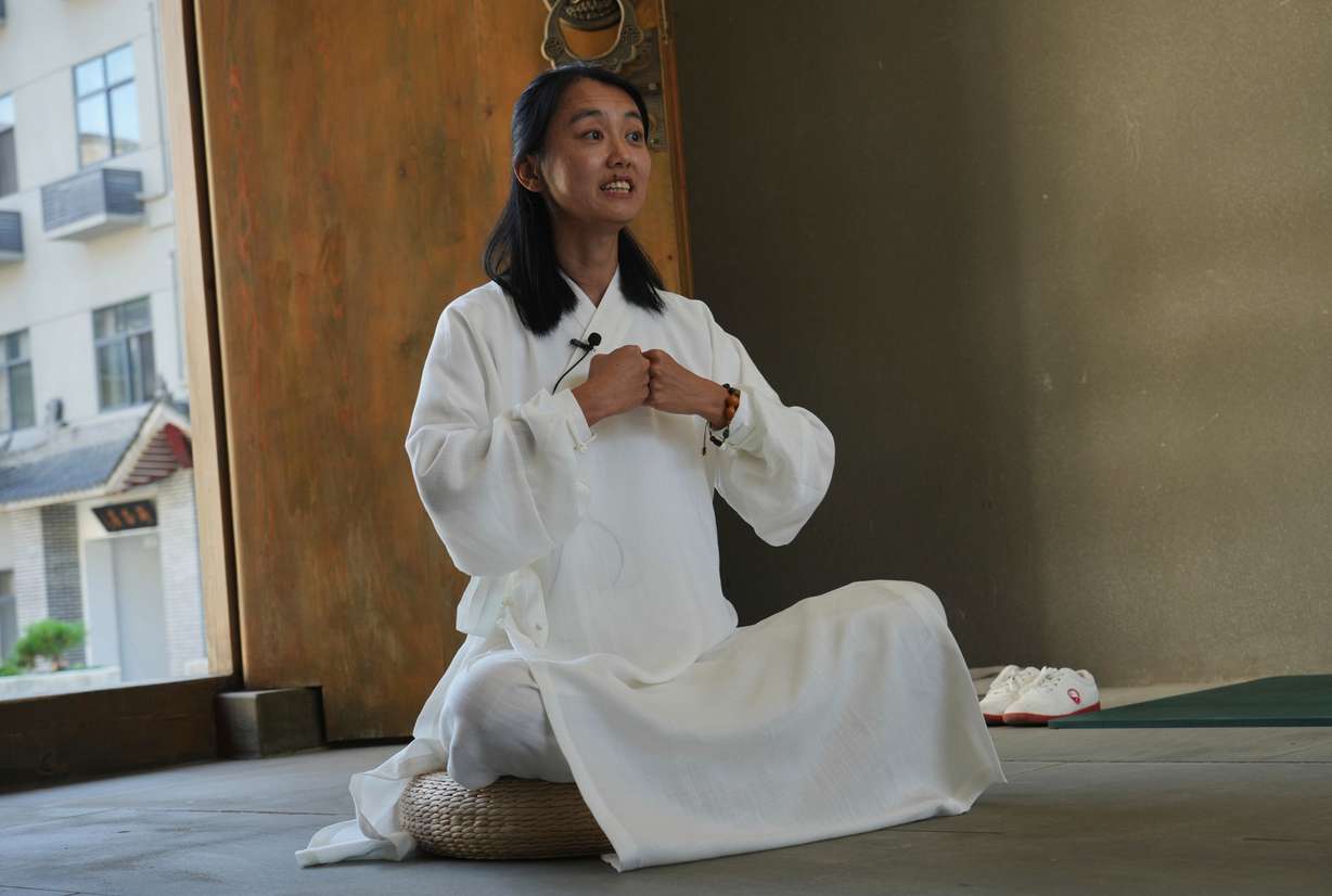 Guo Xinyi, a Chinese student at the Wudang Taoist Traditional Kung Fu Academy, speaks during an interview near Wudang Mountain in Shiyan city in central China's Hubei province on Friday, Sept. 4.