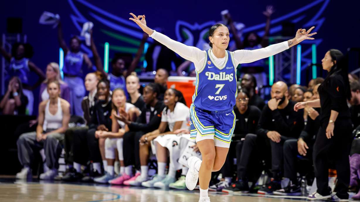 Alysha Clark (7) celebrates a 3-point basket in the first half as the Golden State Valkyries play the Dallas Wings in Game 2 of the WNBA playoffs first round in Arlington, Texas, on Wednesday, Sept. 30, 2026.