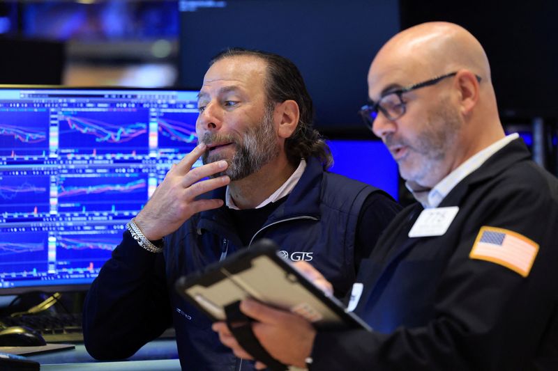 Traders work on the floor at the New York Stock Exchange (NYSE) in New York City, U.S., September 25, 2026.