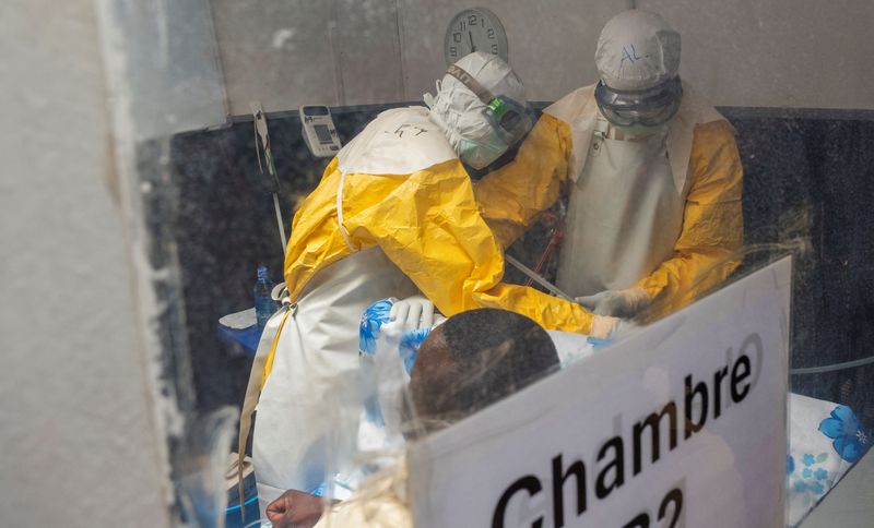 Medecins Sans Frontieres (MSF) doctors treat a patient inside the Kitatumba Ebola treatment center, as aid agencies intensify efforts to contain a new Ebola outbreak involving the Bundibugyo species, in Butembo, North Kivu province, Democratic Republic of Congo, September 23, 2026.