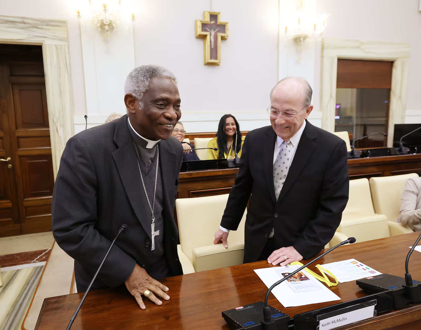 Cardinal Peter Turkson and then-Deseret Management Corporation President Keith McMullin attend a Deseret Management Corporation-partnered symposium on the “Role of Media and Art in Society” at the Vatican in Rome on May 11, 2023. McMullin died on Wednesday at the age of 85.