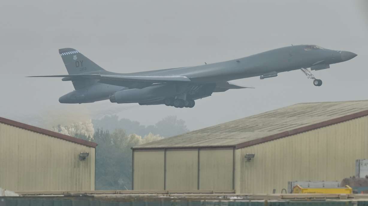 A B-1 bomber takes off from RAF Fairford in Fairford, England, Tuesday. British police have arrested a dual U.K.-Iranian national on suspicion of plotting a terror attack following a security incident at the U.S.-run air base on the weekend.