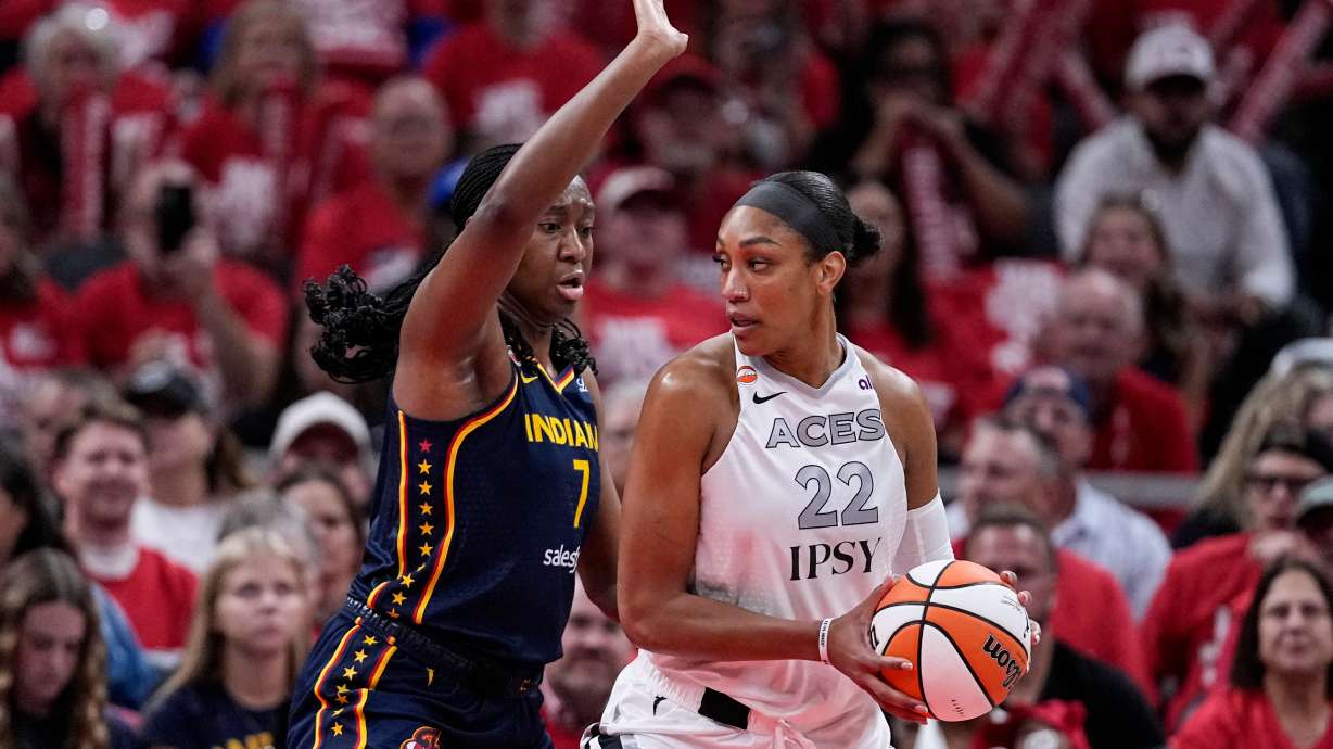 Indiana Fever center Aliyah Boston (7) defends Las Vegas Aces center A'ja Wilson (22) during the first half in Game 2 of a WNBA basketball first-round playoff series in Indianapolis, Tuesday, Sept. 29, 2026.
