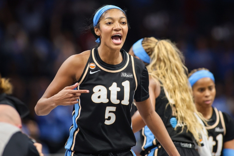 Sep 27, 2026; Atlanta, Georgia, USA; Atlanta Dream forward Angel Reese (5) reacts during a timeout against the Washington Mystics in the third quarter during game one of the first round for the 2026 WNBA Playoffs at State Farm Arena.