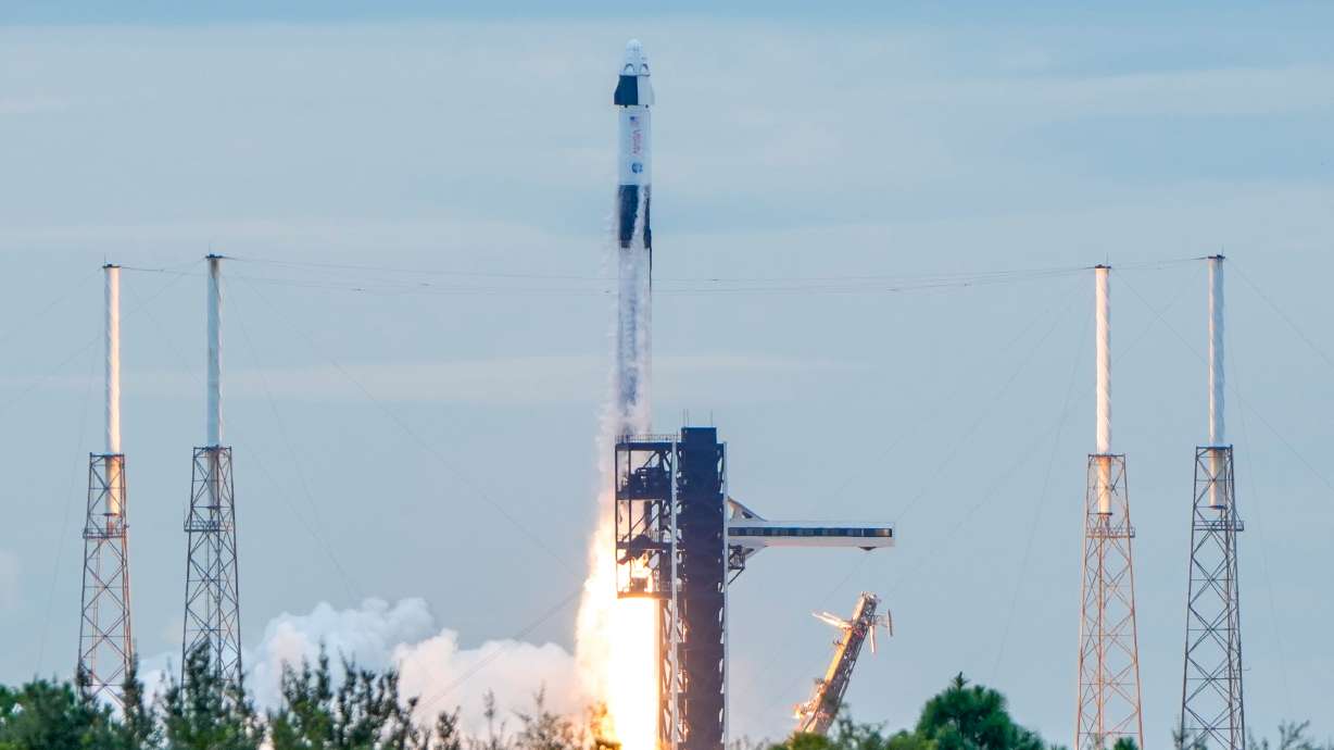 A SpaceX Falcon 9 rocket with a crew of four launches from pad 40 at the Cape Canaveral Space Force Station in Cape Canaveral, Fla., Thursday.
