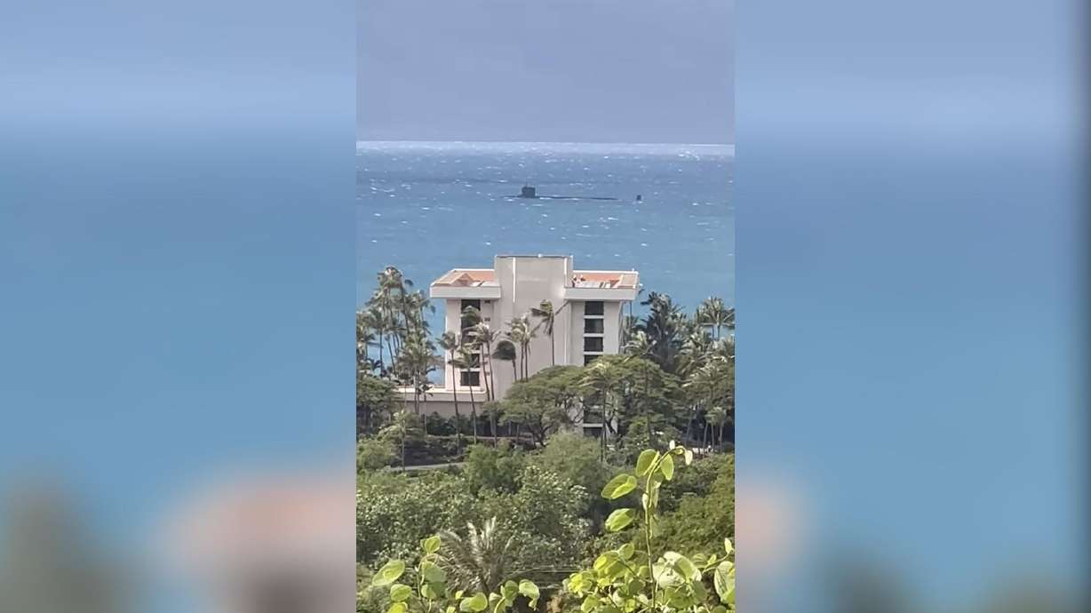 A U.S. Navy submarine is spotted off Lahaina, Maui, Hawaii, Feb. 3, 2024.