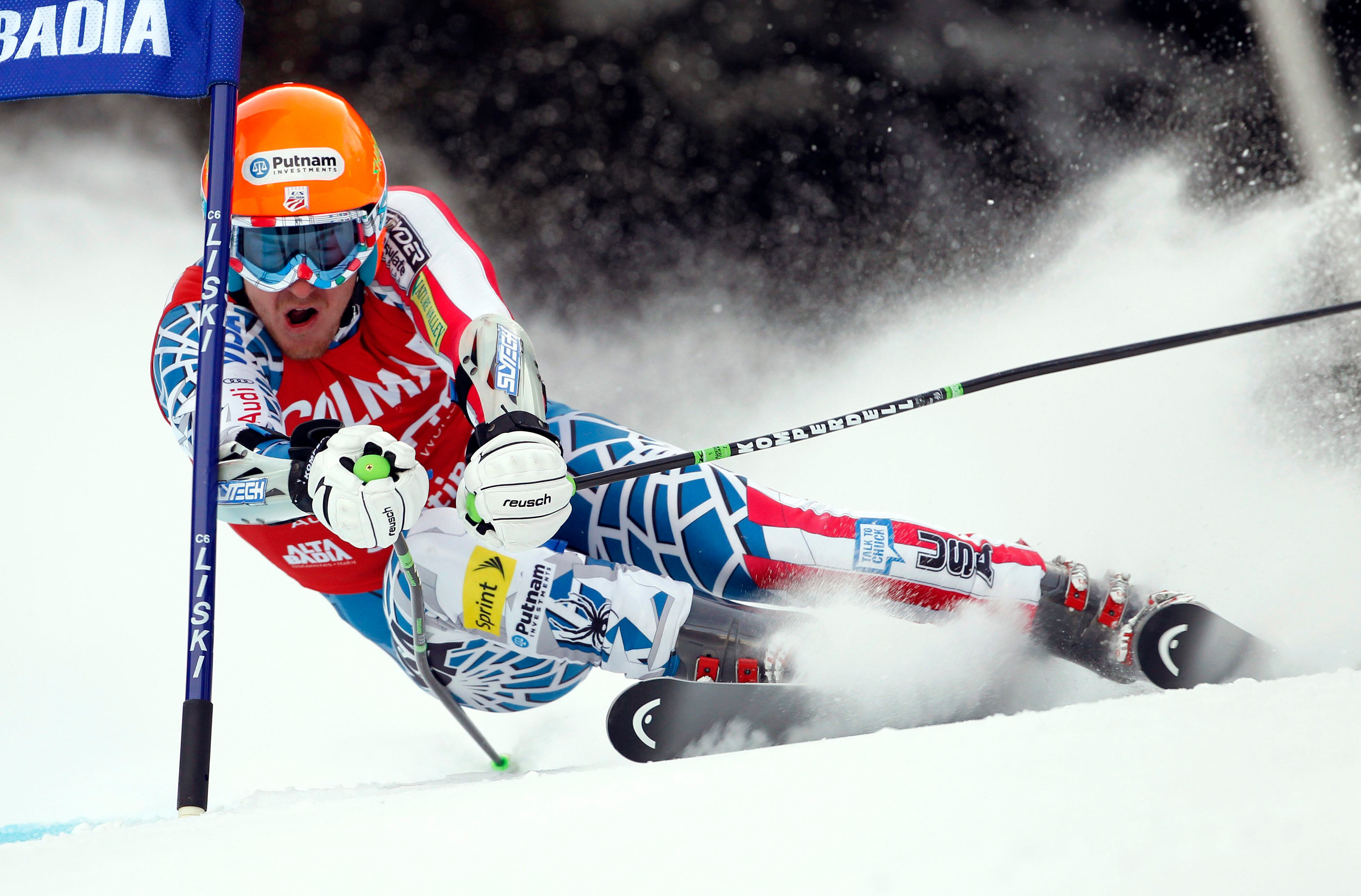Ted Ligety of the United States passes a gate during the first run of an alpine ski men's World Cup giant slalom race, in Alta Badia, Italy, in this Sunday, Dec. 19, 2010, file photo.