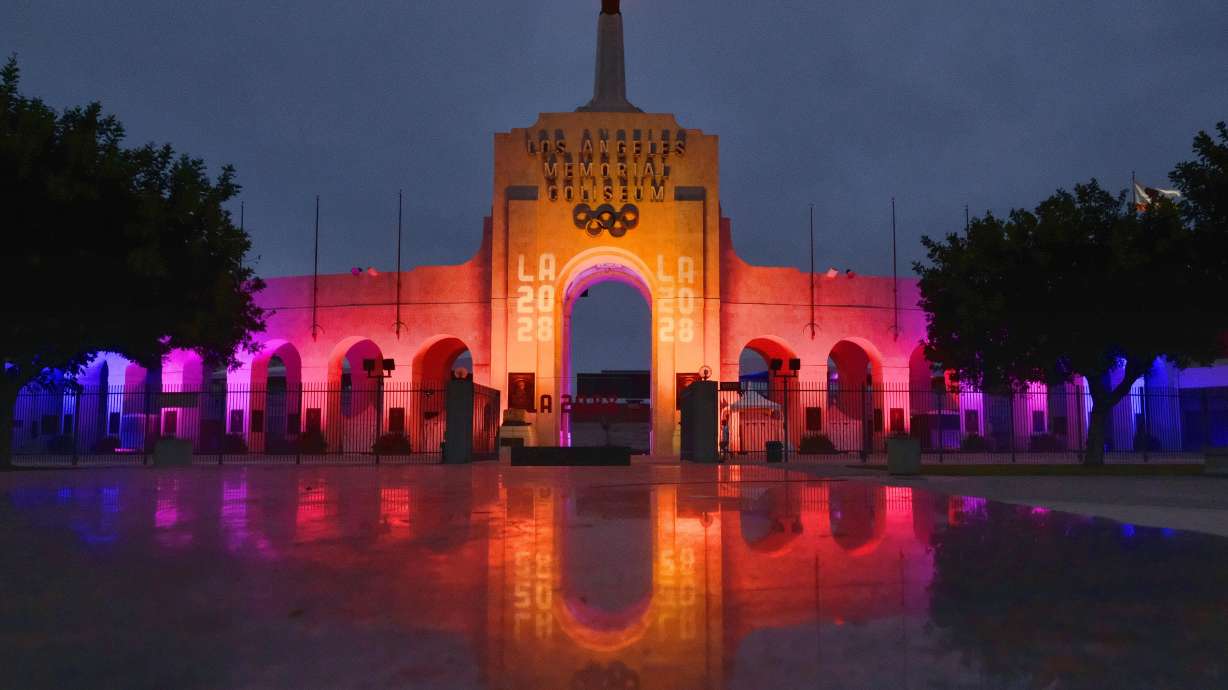 A blazing Olympic cauldron is seen at the Los Angeles Memorial Coliseum on Sept. 13, 2017. The Olympic torch relay is returning to the U.S. for the first time since the 2002 Winter Games in Utah.