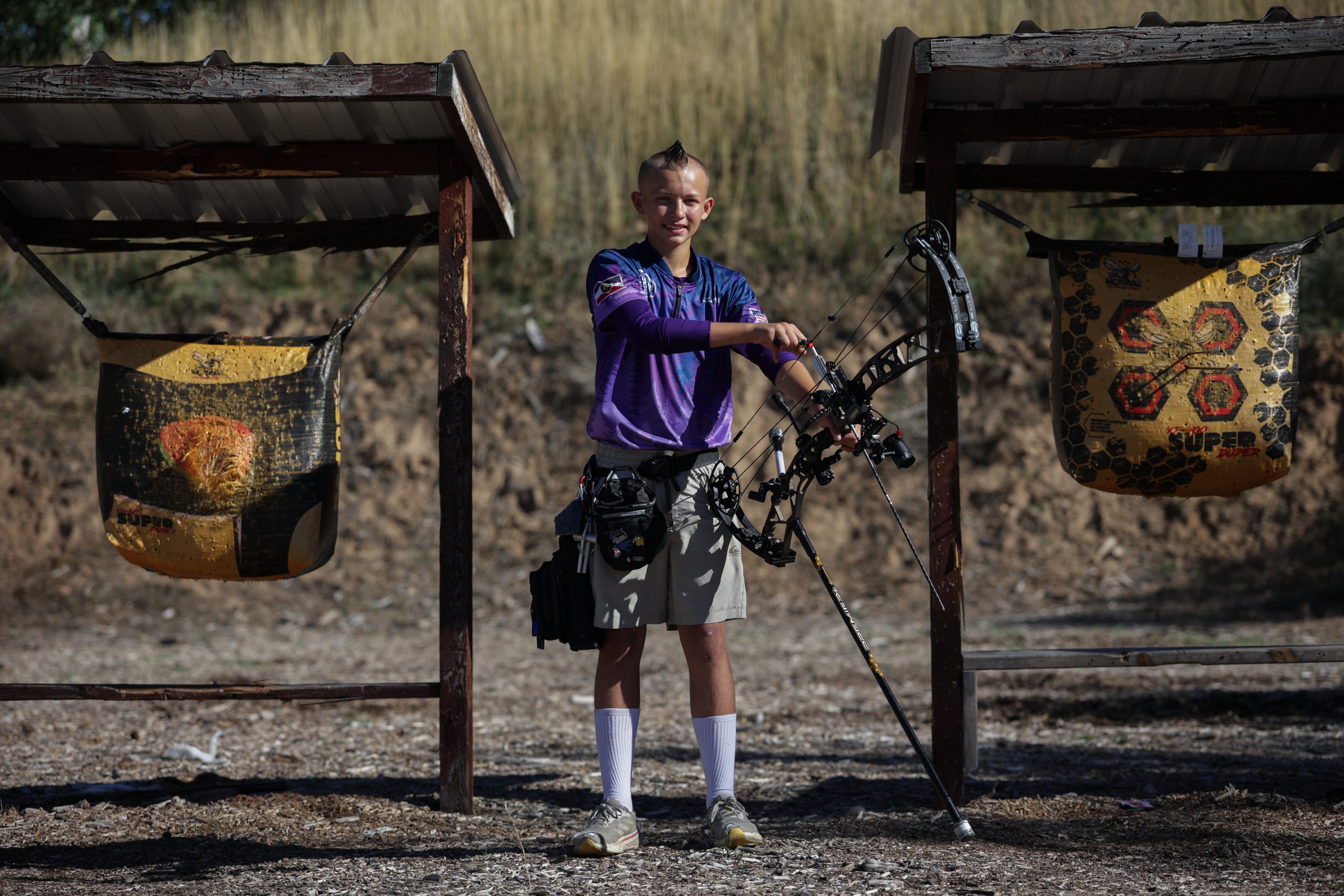 Joukai Omura, 12, poses for a portrait at Weber County Archery Park in Ogden in Thursday.