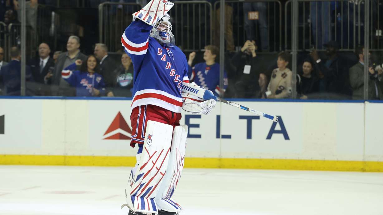 New York Rangers goaltender Igor Shesterkin reacts after scoring a goal during the third period of an NHL hockey game against the Tampa Bay Lightning Thursday, Oct. 1, 2026, in New York.