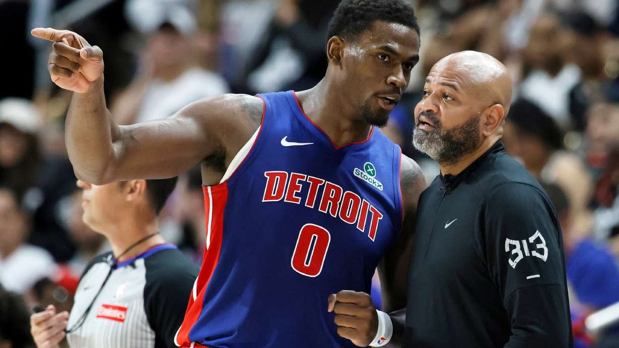 FILE - Detroit Pistons center Jalen Duren (0) talks with head coach J.B. Bickerstaff during the first half in Game 7 of a second-round NBA playoffs basketball series May 17, 2026, in Detroit.