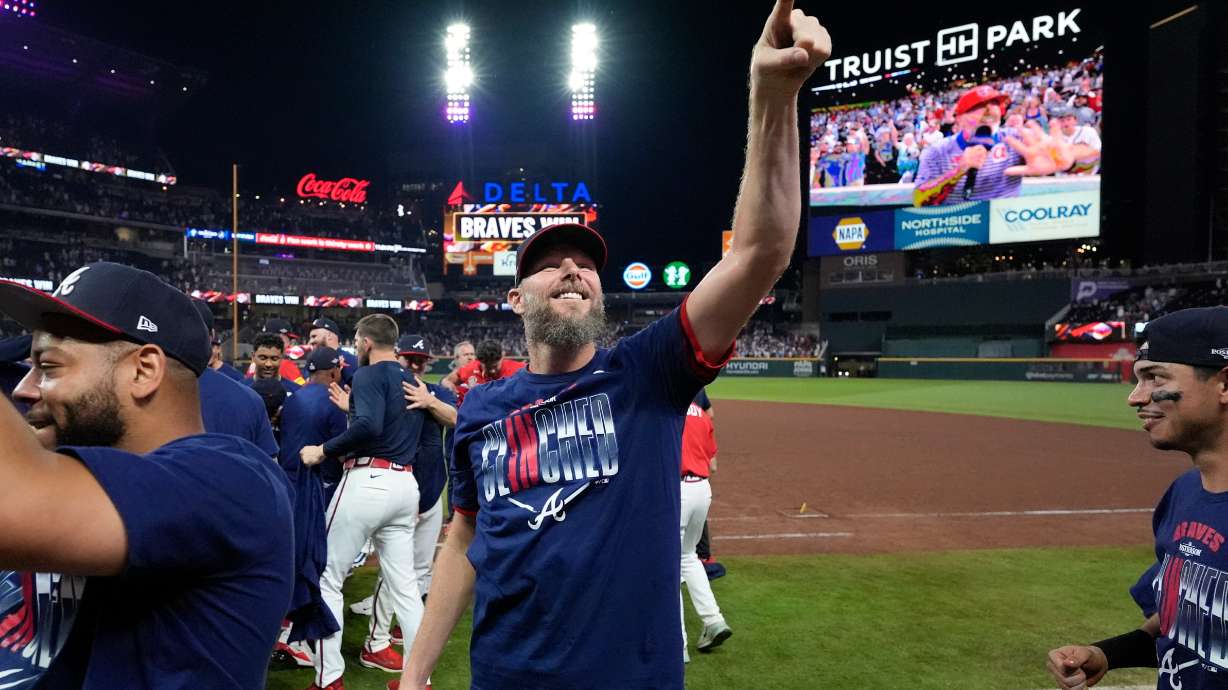 Atlanta Braves pitcher Chris Sale points ot the crowd after Game 3 of baseball's NL Wild Card Series against the Philadelphia Phillies, Thursday, Oct. 1, 2026, in Atlanta.