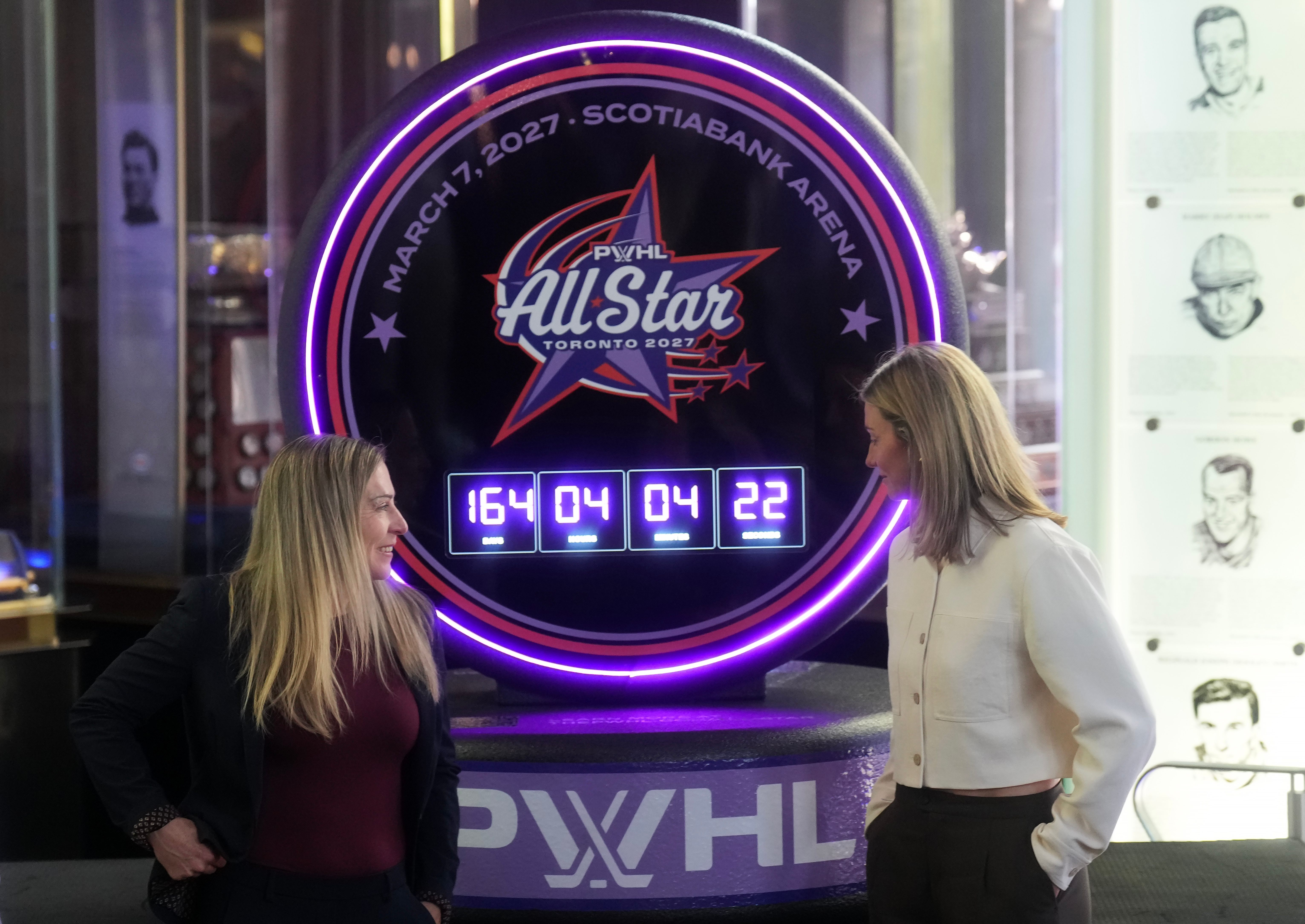 Jayna Hefford, left, Executive Vice President of Hockey Operations for the PWHL, and Laura Stacey, PWHL Players Association President talk as they announce the first ever PWHL All-Star Game, which will take place in Toronto next year, during a press conference in Toronto, Thursday, Sept. 24, 2026. 