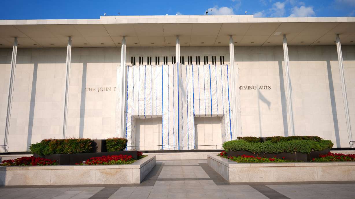 A tarp covers a portions of the signage at the John F. Kennedy Center for the Performing Arts, Sept. 17, in Washington. The Kennedy Center Honors will be held at Capital One Arena this year, a spokesperson said on Friday.