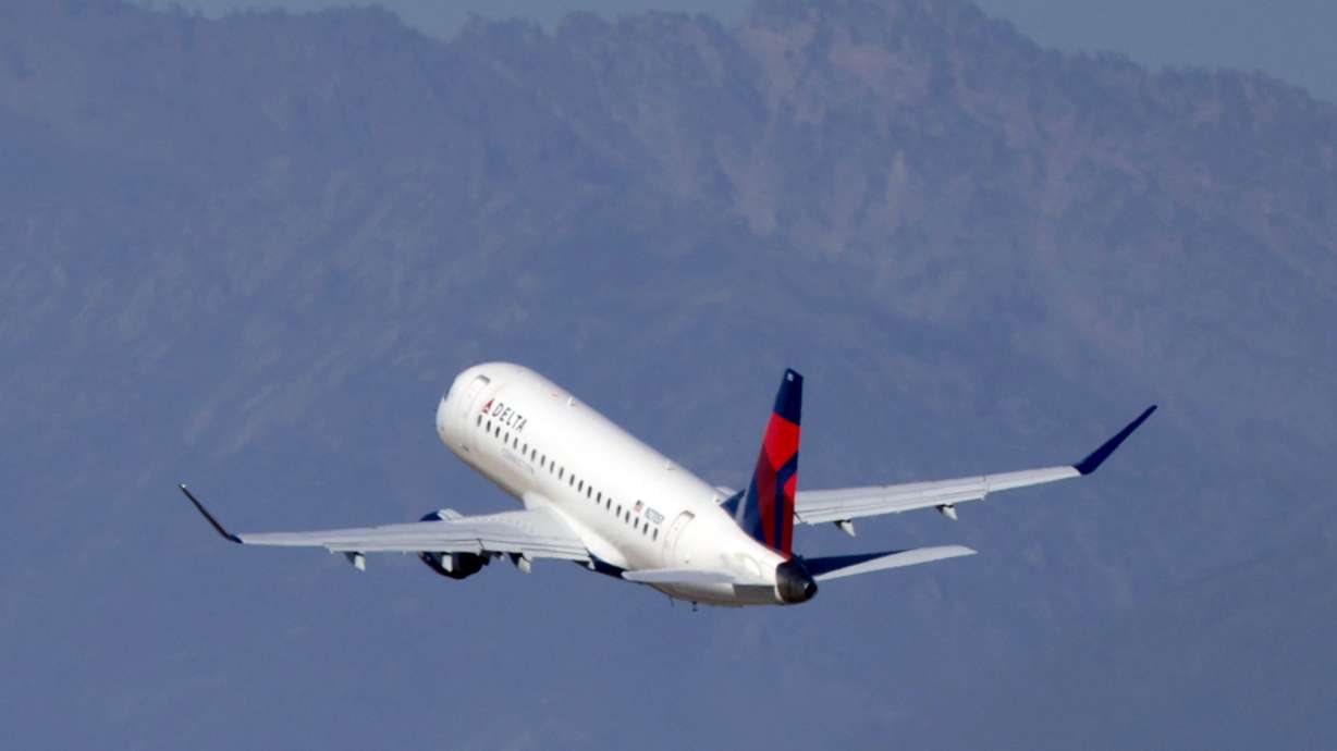 A Delta Airlines plane takes off from Salt Lake City International Airport on Sept. 14, 2024. The fight for better Wi-Fi at 30,000 feet landed on X this week, where Elon Musk said Delta Air Lines CEO Ed Bastian would "lose his job" after the airline rejected Starlink in favor of Amazon's satellite service.