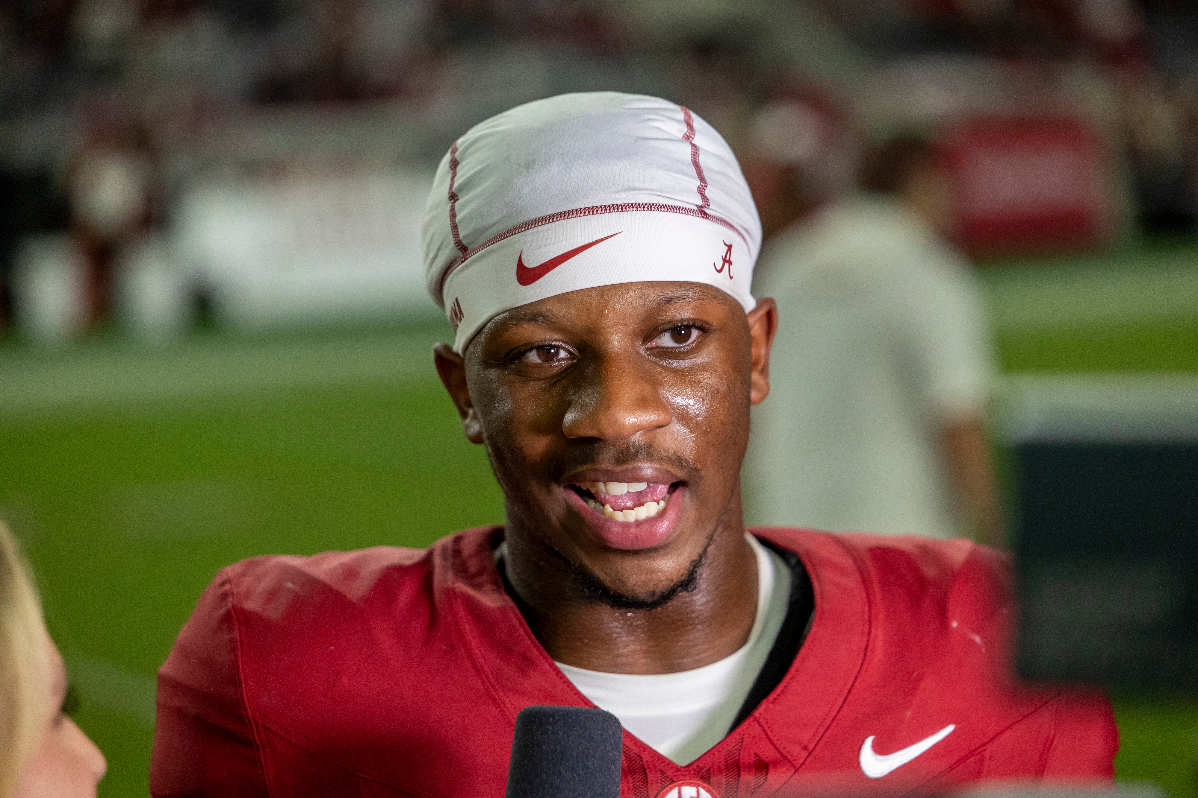 Alabama quarterback Keelon Russell (12) talks with ESPN after a win against Florida State at an NCAA college football game Saturday, Sept. 19, 2026, in Tuscaloosa, Ala. 