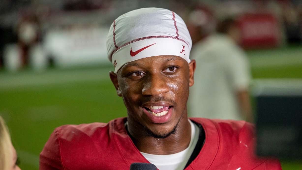 Alabama quarterback Keelon Russell (12) talks with ESPN after a win against Florida State at an NCAA college football game Saturday, Sept. 19, 2026, in Tuscaloosa, Ala.