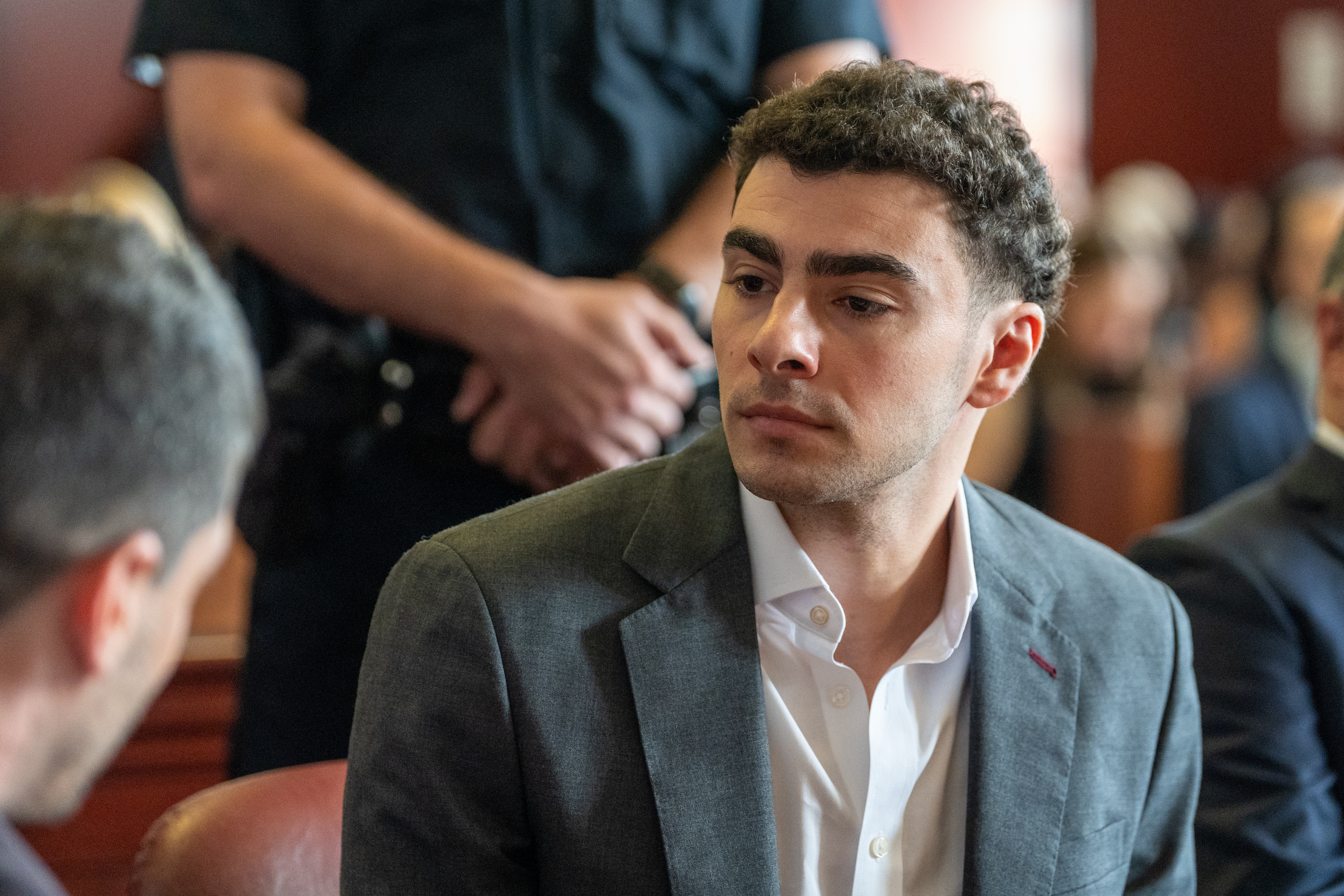 Luigi Mangione appears for a pre-trial hearing at Manhattan Criminal Court in New York, on Aug. 11. Bodycam footage released on Friday showed officers arresting Mangione at a Pennsylvania McDonald's.