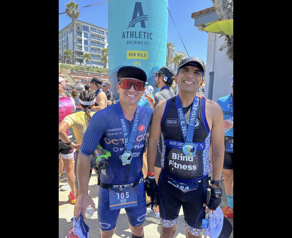 Adrian Broca, 49, is a marathonner and triathlete who is blind. He sill be running the St. George Marathon on Oct. 3 and Nate Arlengo and Sean Feeny will be guiding him on the course.