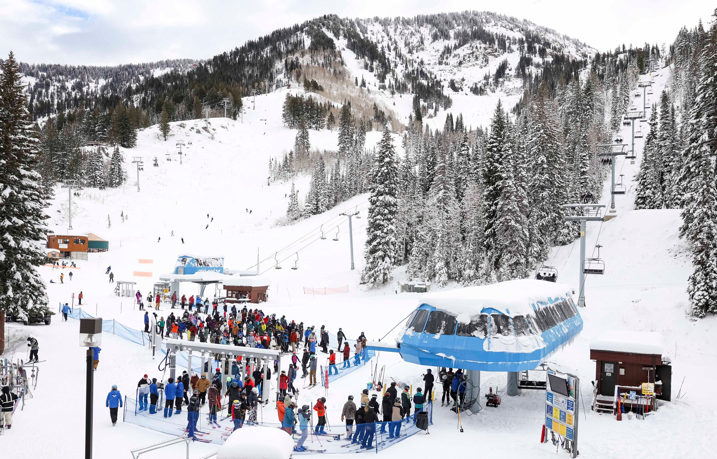 Riders line up for the Gadzoom lift on opening day at Snowbird Ski Resort in Snowbird on Dec. 7. A super El Nino could be setting up a winter unlike any other.