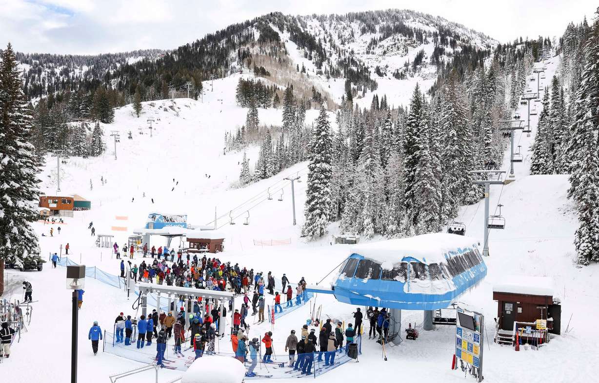 Riders line up for the Gadzoom lift on opening day at Snowbird Ski Resort in Snowbird on Dec. 7. A super El Nino could be setting up a winter unlike any other.