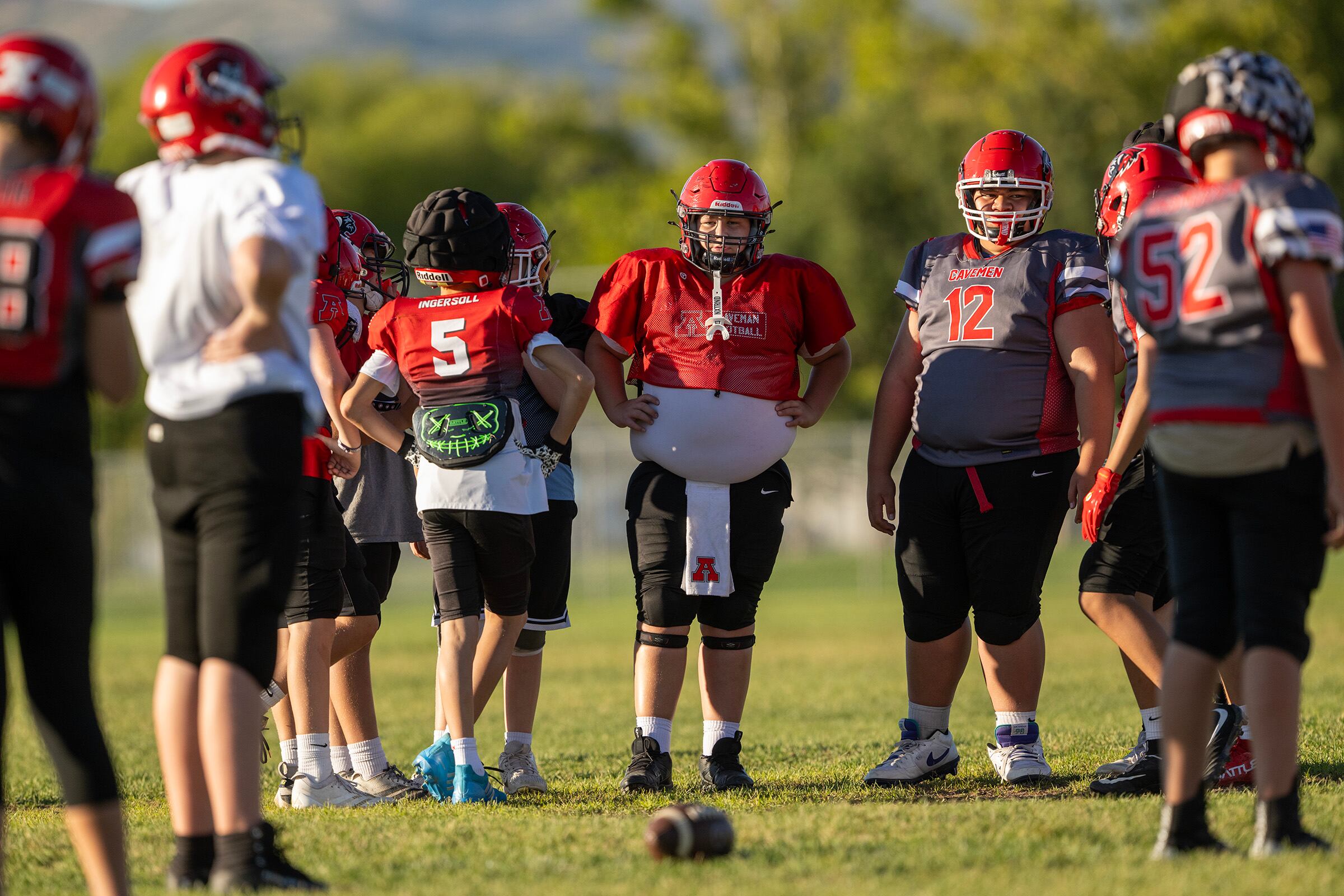 Members of a youth football team in American Fork go through their practice at American Fork Jr. High on on Sept. 23. A new poll showed parents are comfortable with kids playing football nationwide — to an extent.
