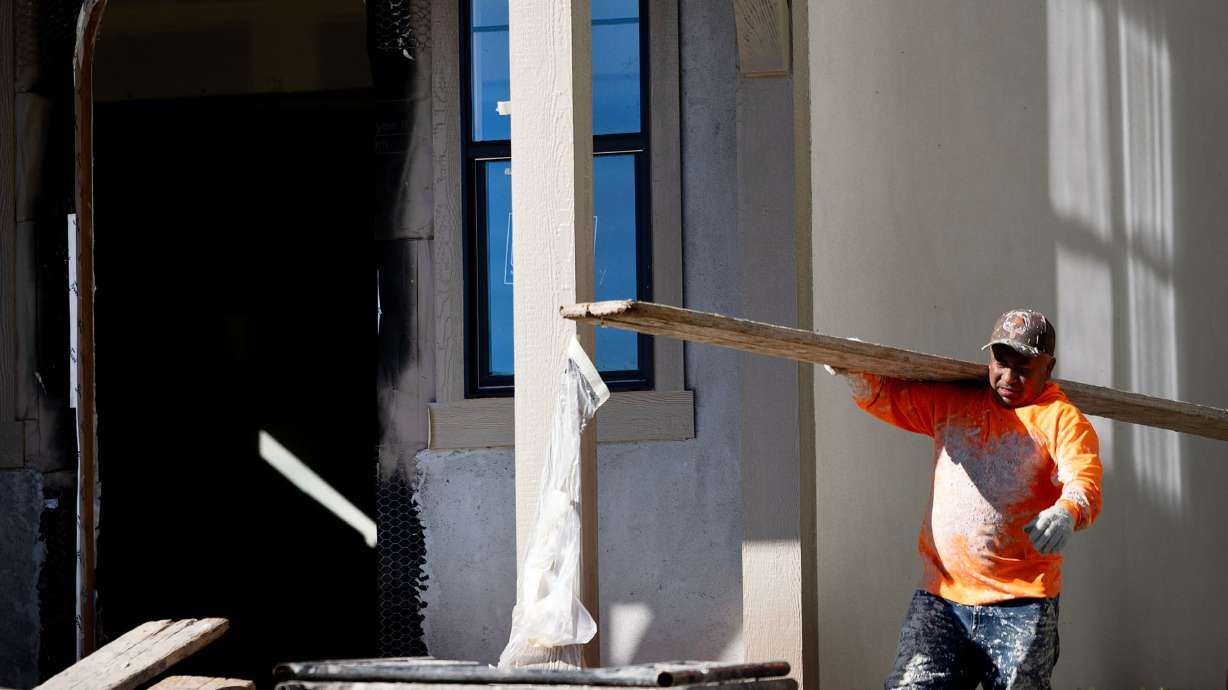 A home is constructed in Salt Lake City on Thursday. Ten-year Treasury yields briefly surpassed 5.3% Thursday, surpassing a mark not seen since 2002 before settling back to a rate of just over 5.25%.