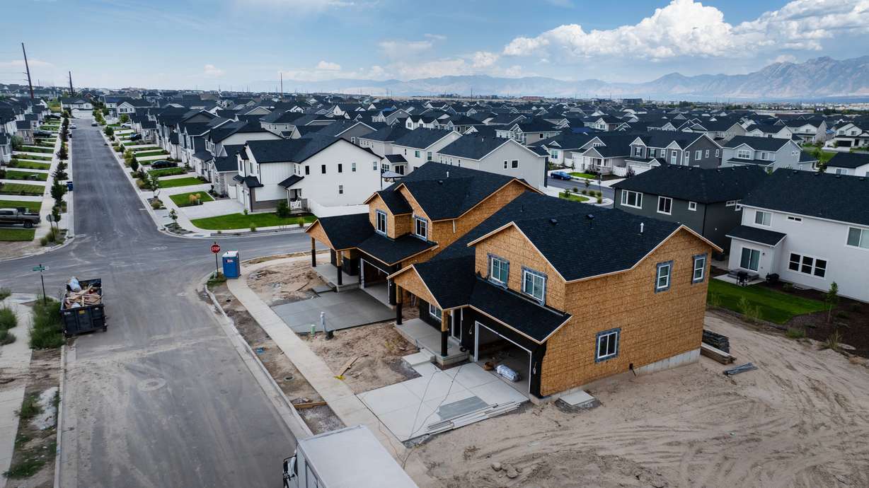 New homes and apartments in the South Jordan area on Aug. 24. Treasury bonds hit their highest mark since 2002, which could have an impact on mortgages for houses.