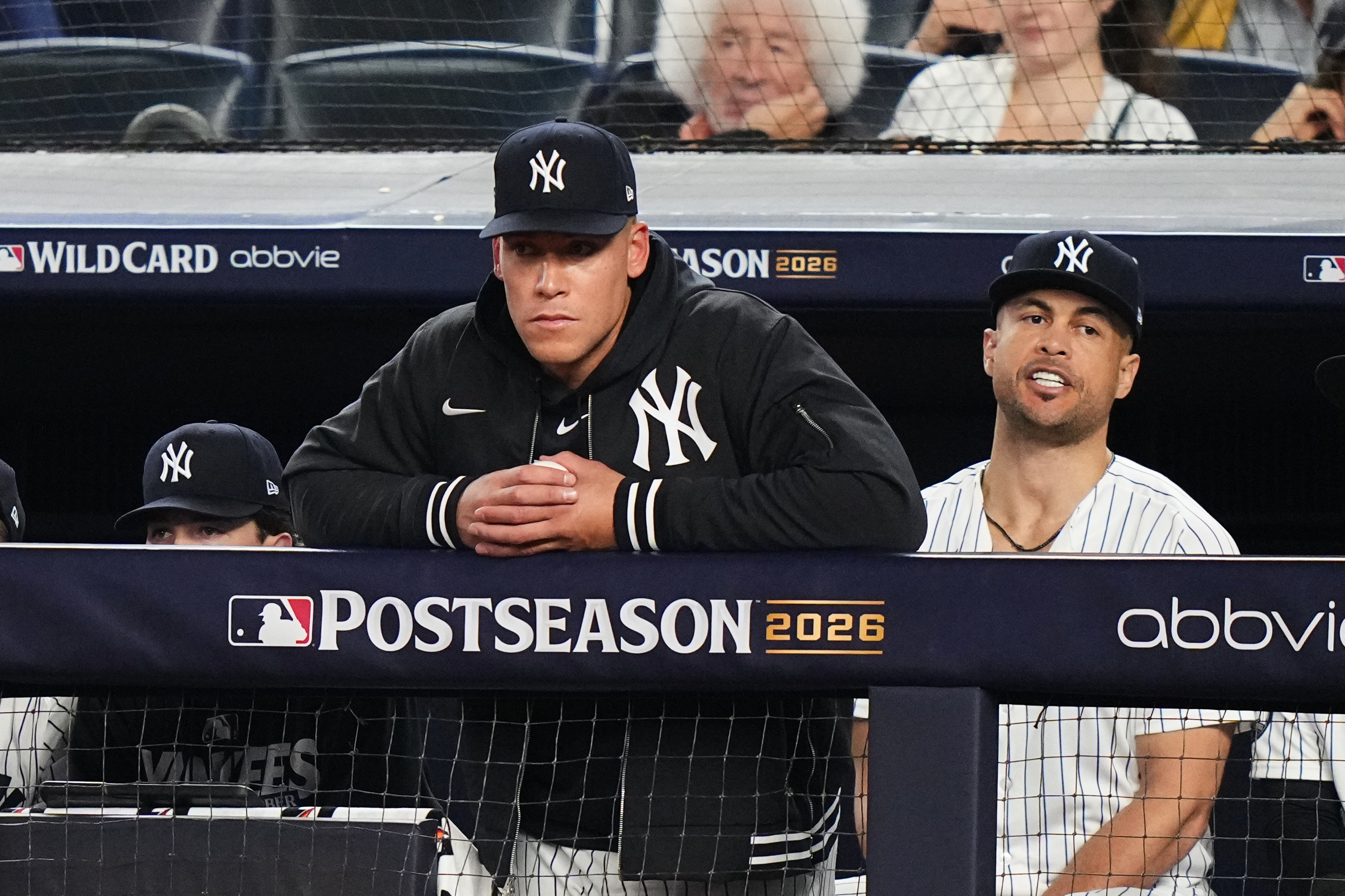 New York Yankees' Aaron Judge, left, and Giancarlo Stanton, right, watch from the dugout during the ninth inning against the Boston Red Sox in Game 2 of baseball's American League Wild Card Series, Wednesday, Sept. 30, 2026, in New York. 